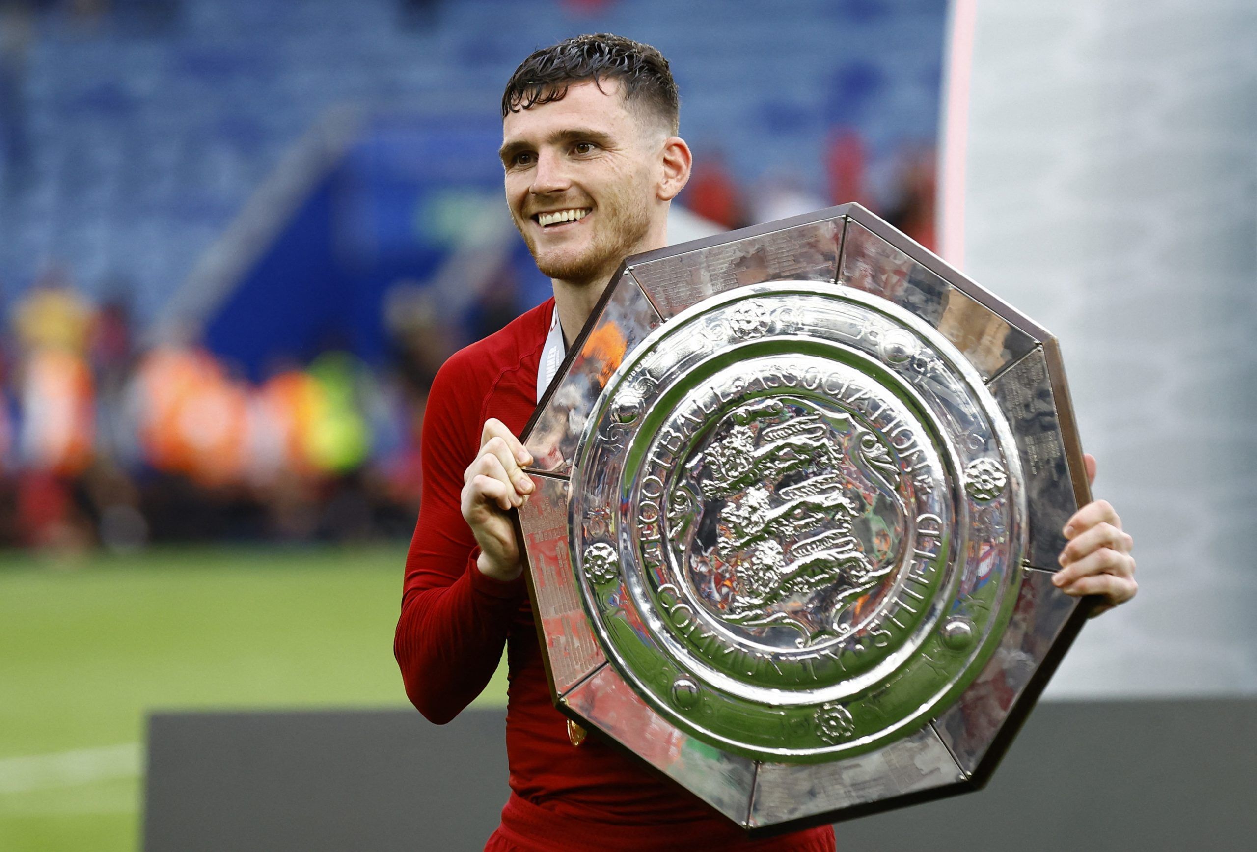 Soccer Football - Community Shield - Liverpool v Manchester City - King Power Stadium, Leicester, Britain - July 30, 2022 Liverpool's Andrew Robertson celebrates with the trophy after winning the Community Shield Action Images via Reuters/Andrew Boyers