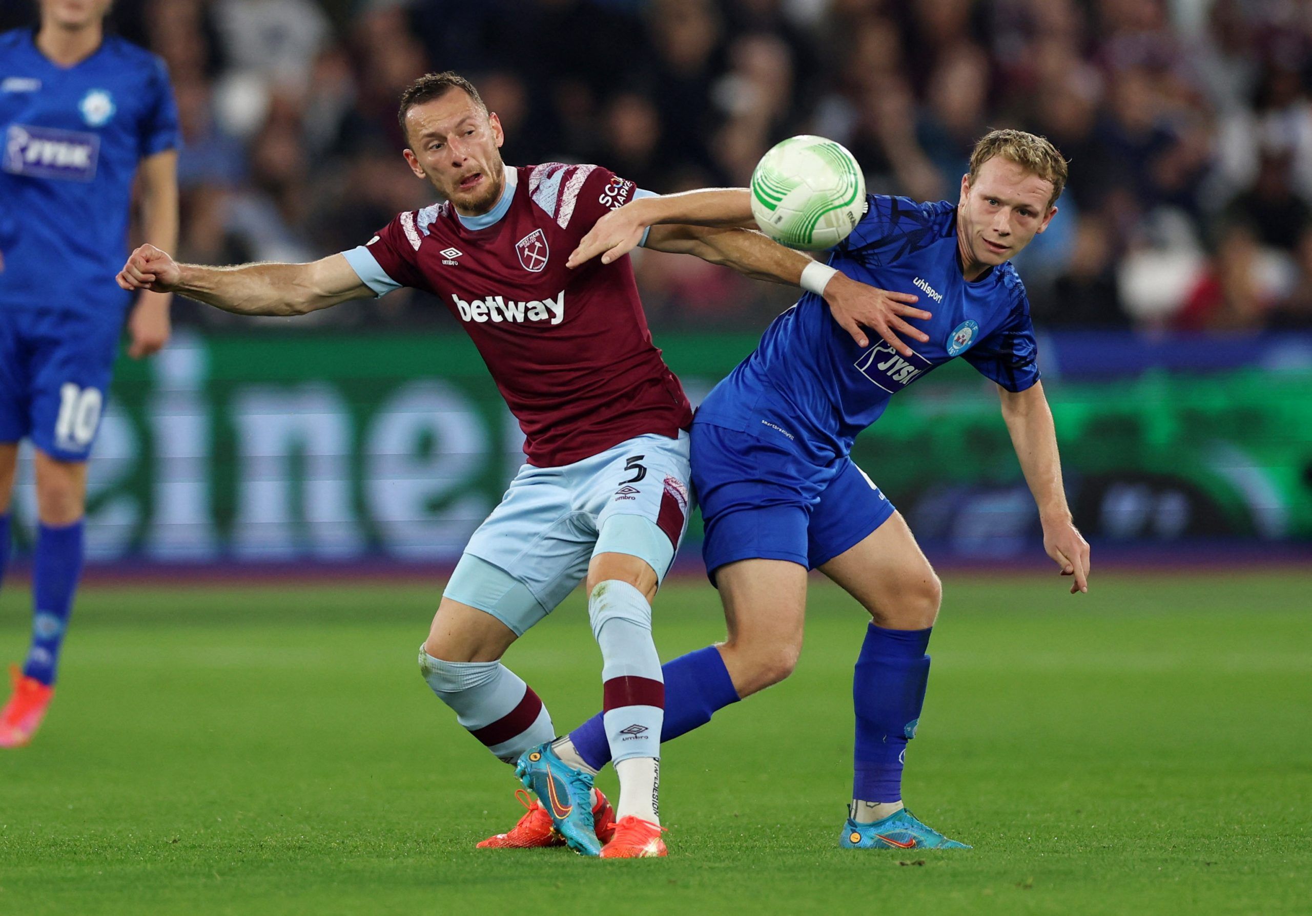 Soccer Football - Europa Conference League - Group B - West Ham United v Silkeborg - London Stadium, London, Britain - October 27, 2022 West Ham United's Vladimir Coufal in action with Silkeborg's Anders Klynge Action Images via Reuters/Matthew Childs