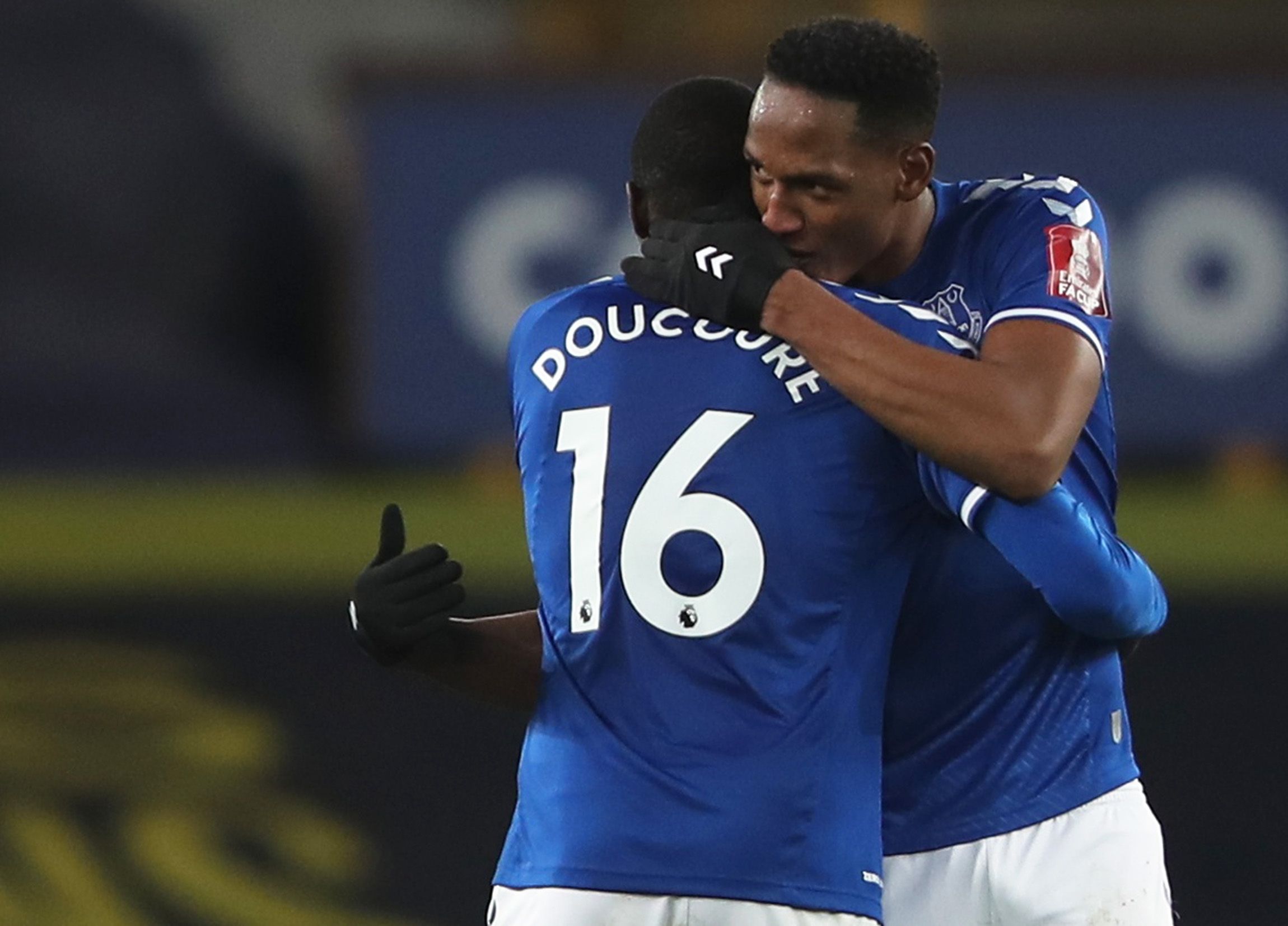 Soccer Football - FA Cup - Fourth Round - Everton v Sheffield Wednesday - Goodison Park, Liverpool, Britain - January 24, 2021 Everton's Yerry Mina celebrates with Abdoulaye Doucoure after the match Action Images via Reuters/Molly Darlington