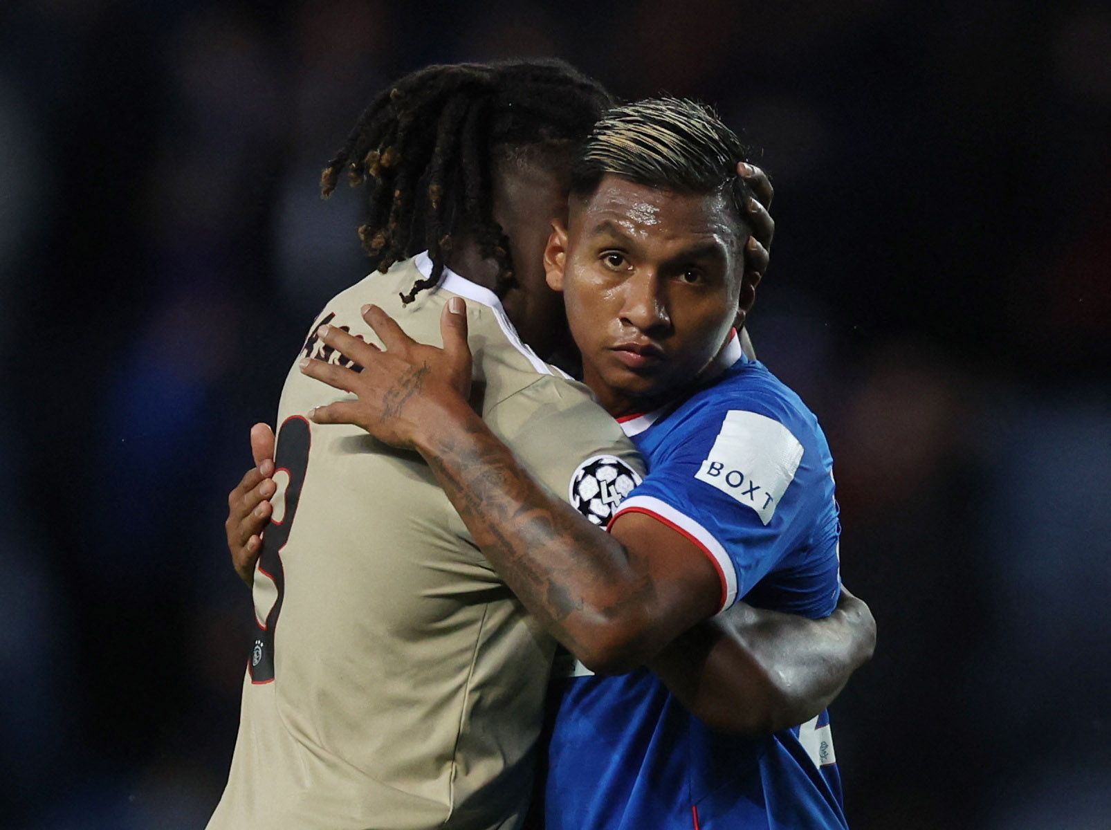 Soccer Football - Champions League - Group A - Rangers v Ajax Amsterdam - Ibrox Stadium, Glasgow, Scotland, Britain - November 1, 2022 Rangers' Alfredo Morelos with Ajax Amsterdam's Calvin Bassey after the match Action Images via Reuters/Lee Smith