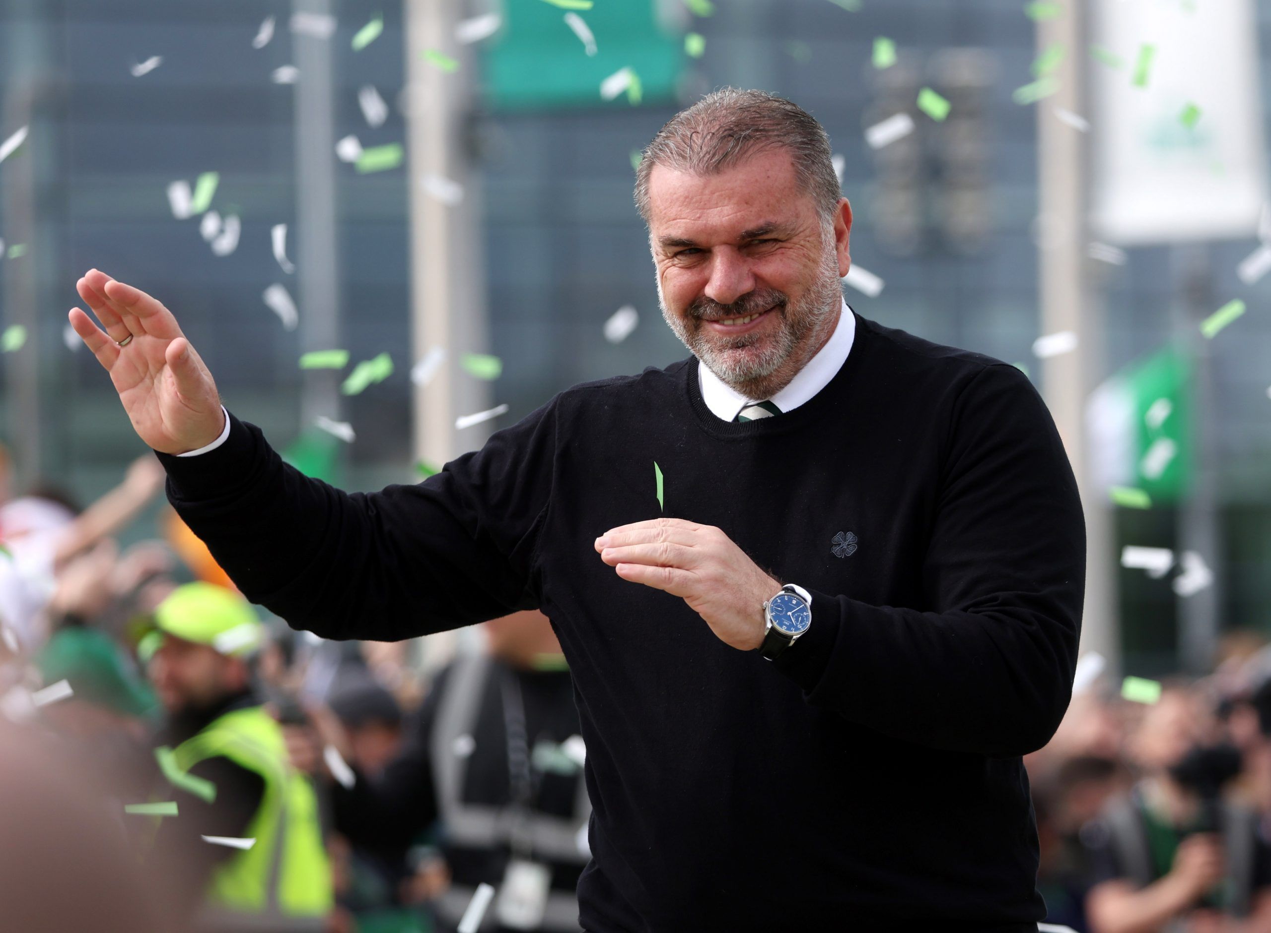 Soccer Football - Scottish Premiership - Celtic v Motherwell - Celtic Park, Glasgow, Scotland, Britain - May 14, 2022 Celtic manager Ange Postecoglou acknowledges fans outside the stadium before the match REUTERS/Russell Cheyne