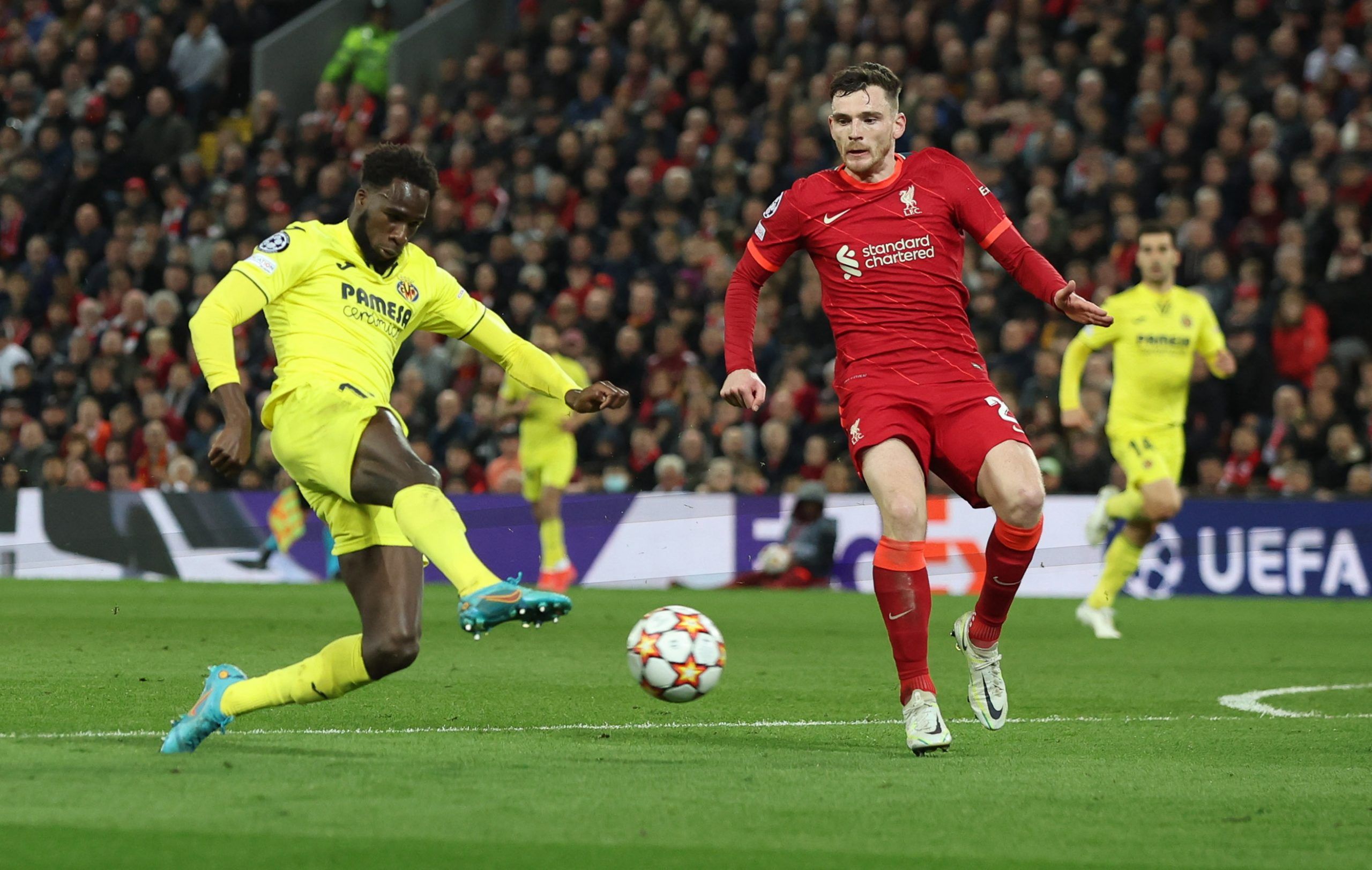 Soccer Football - Champions League - Semi Final - First Leg - Liverpool v Villarreal - Anfield, Liverpool, Britain - April 27, 2022 Villarreal's Boulaye Dia in action with Liverpool's Andrew Robertson REUTERS/Phil Noble