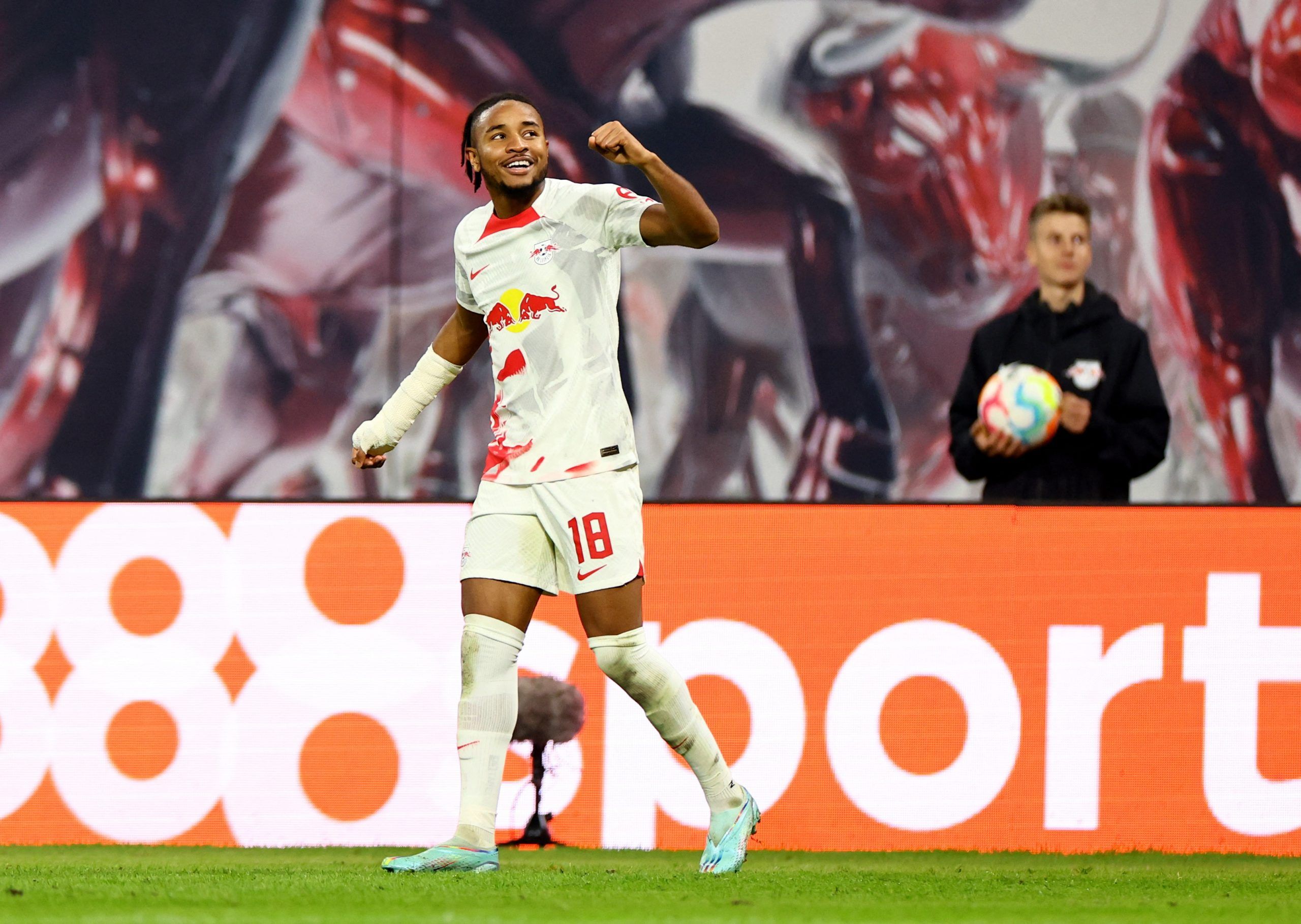 Soccer Football - Bundesliga - RB Leipzig v Freiburg - Red Bull Arena, Leipzig, Germany - November 9, 2022 RB Leipzig's Christopher Nkunku celebrates scoring their second goal REUTERS/Lisi Niesner DFL REGULATIONS PROHIBIT ANY USE OF PHOTOGRAPHS AS IMAGE SEQUENCES AND/OR QUASI-VIDEO.