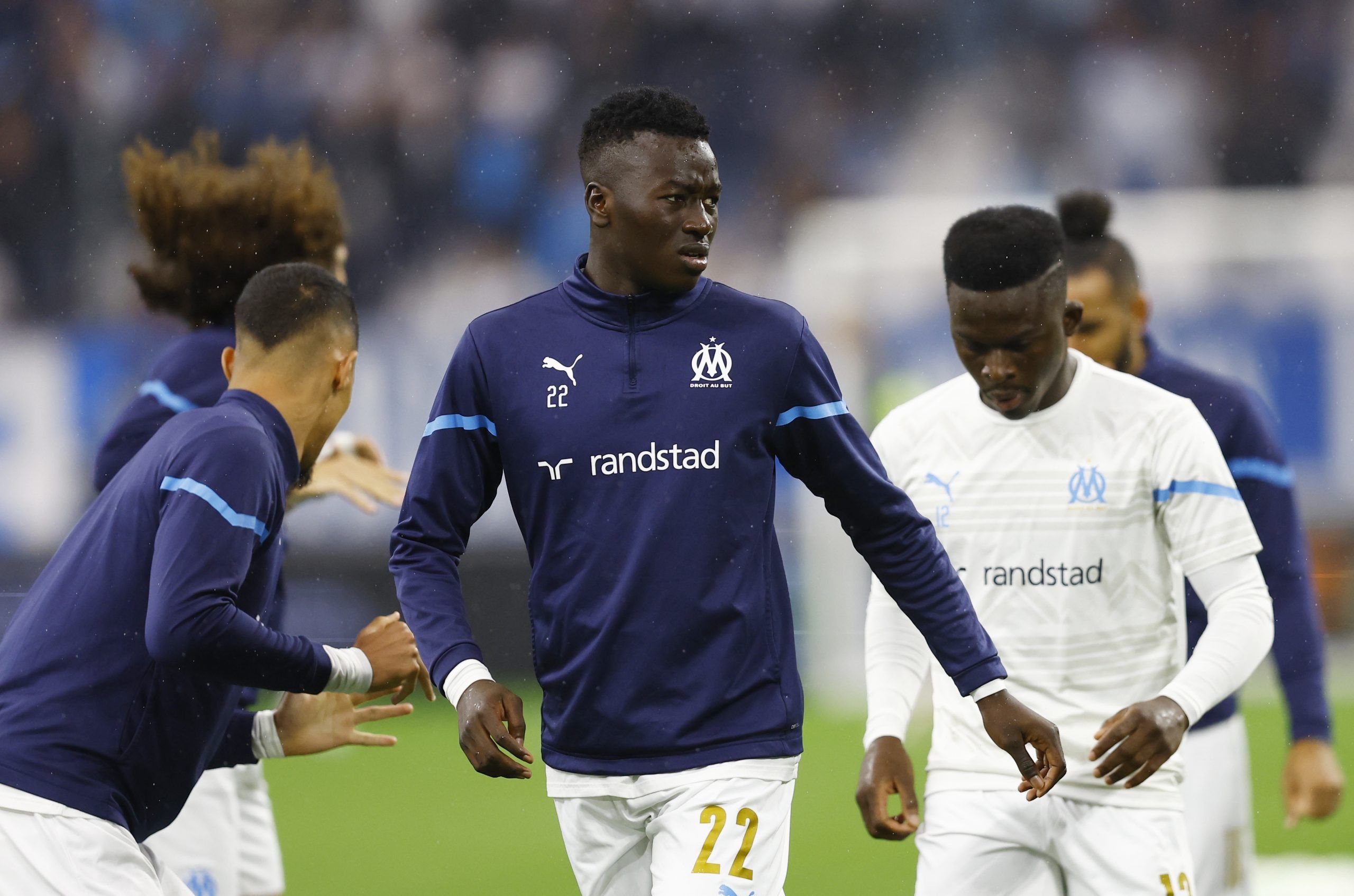 Soccer Football - Europa Conference League - Semi Final - Second Leg - Olympique de Marseille v Feyenoord - Orange Velodrome, Marseille, France - May 5, 2022 Olympique de Marseille's Pape Gueye with teammates during the warm up before the match REUTERS/Stephane Mahe