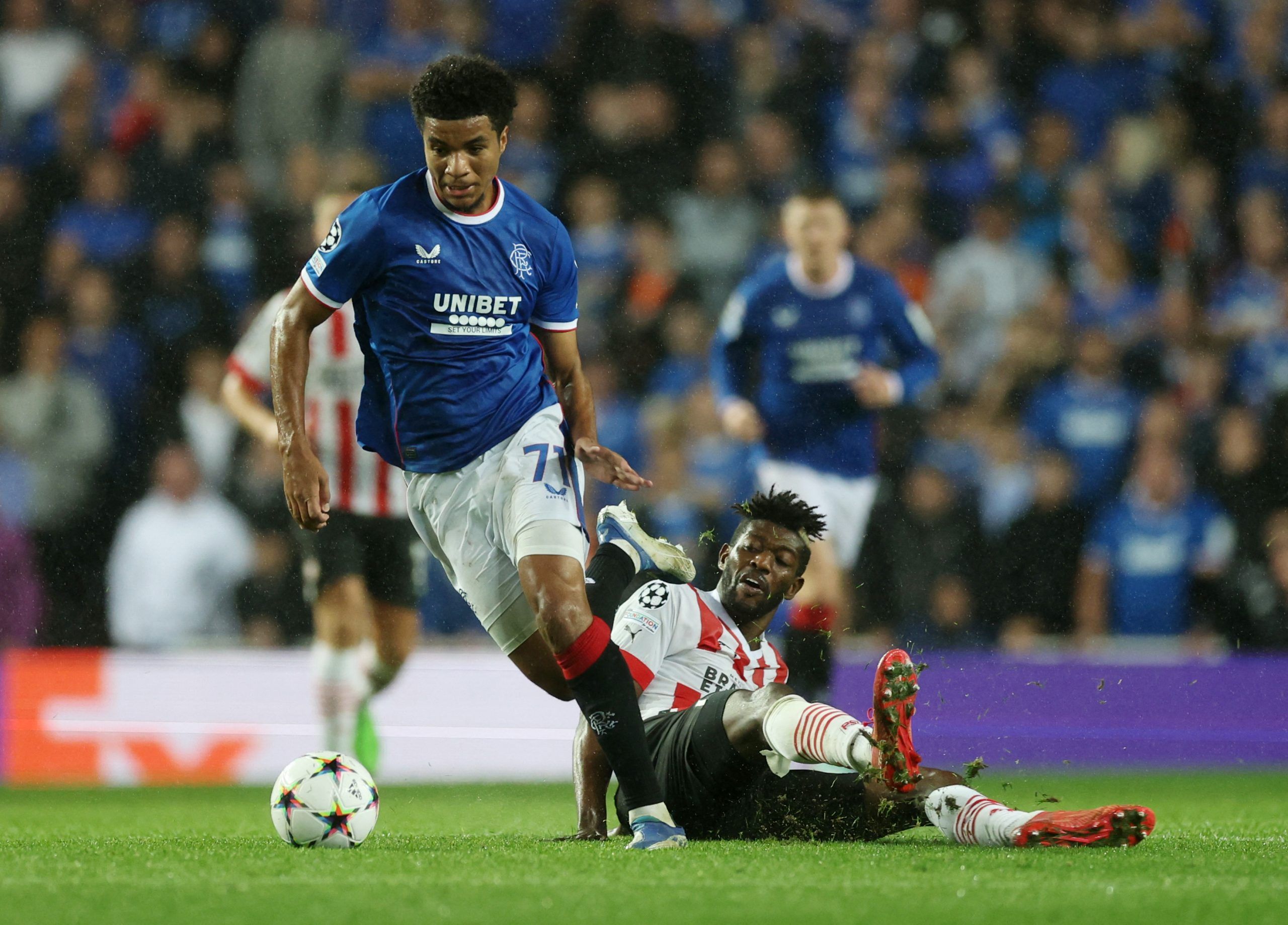 Soccer Football - Champions League Qualifying - Play-off First Leg - Rangers v PSV Eindhoven - Ibrox Stadium, Glasgow, Scotland, Britain - August 16, 2022 Rangers' Malik Tillman in action with PSV Eindhoven's Ibrahim Sangare Action Images via Reuters/Lee Smith
