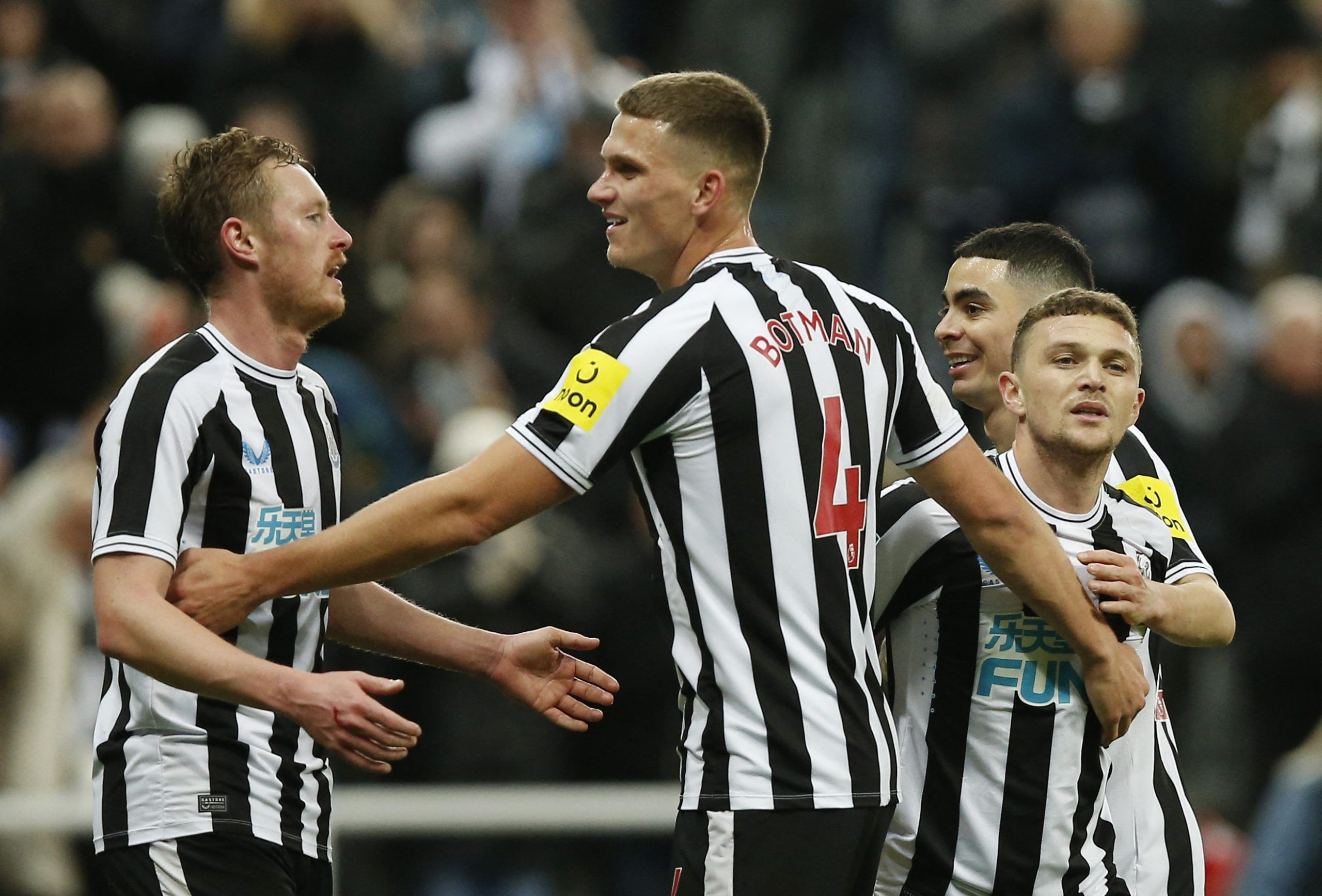 Soccer Football - Carabao Cup - Round of 16 - Newcastle United v AFC Bournemouth - St James' Park, Newcastle, Britain - December 20, 2022 Newcastle United's Sean Longstaff, Sven Botman, Kieran Trippier and Miguel Almiron celebrate after AFC Bournemouth's Adam Smith scores an own goal and Newcastle United's first Action Images via Reuters/Craig Brough EDITORIAL USE ONLY. No use with unauthorized audio, video, data, fixture lists, club/league logos or 'live' services. Online in-match use limited t