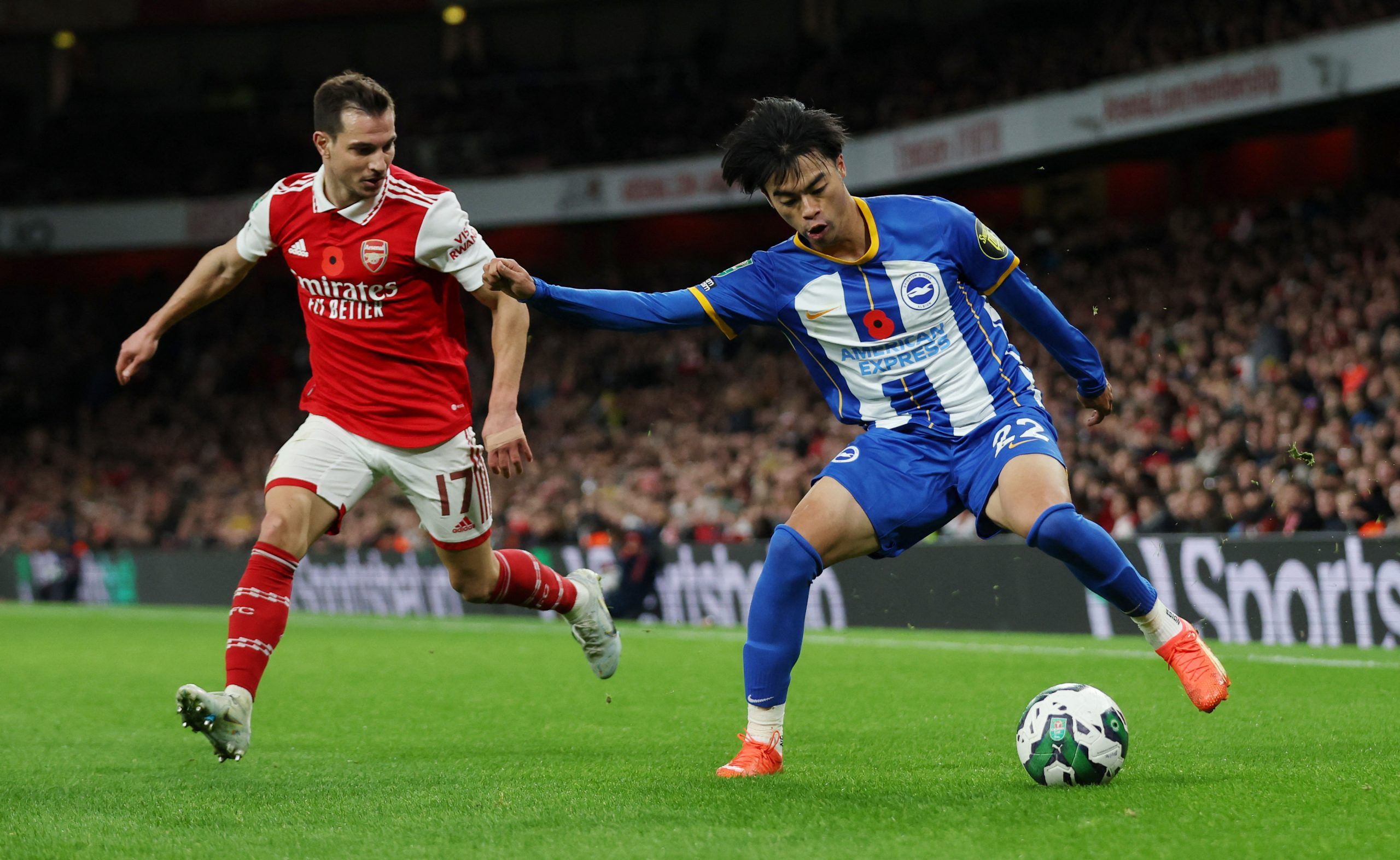 Soccer Football - Carabao Cup Third Round - Arsenal v Brighton &amp; Hove Albion - Emirates Stadium, London, Britain - November 9, 2022 Brighton &amp; Hove Albion's Kaoru Mitoma in action with Arsenal's Cedric Soares Action Images via Reuters/Matthew Childs EDITORIAL USE ONLY. No use with unauthorized audio, video, data, fixture lists, club/league logos or 'live' services. Online in-match use limited to 75 images, no video emulation. No use in betting, games or single club /league/player publica