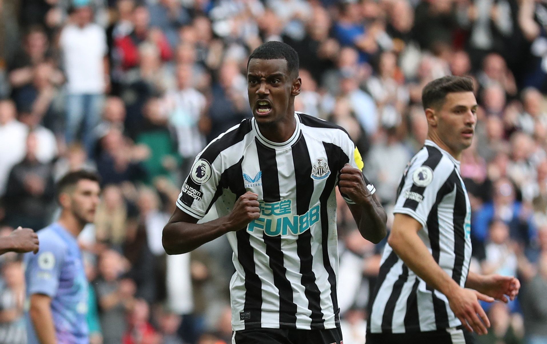  Alexander Isak celebrates scoring a goal for Newcastle United during a match at St. James' Park.