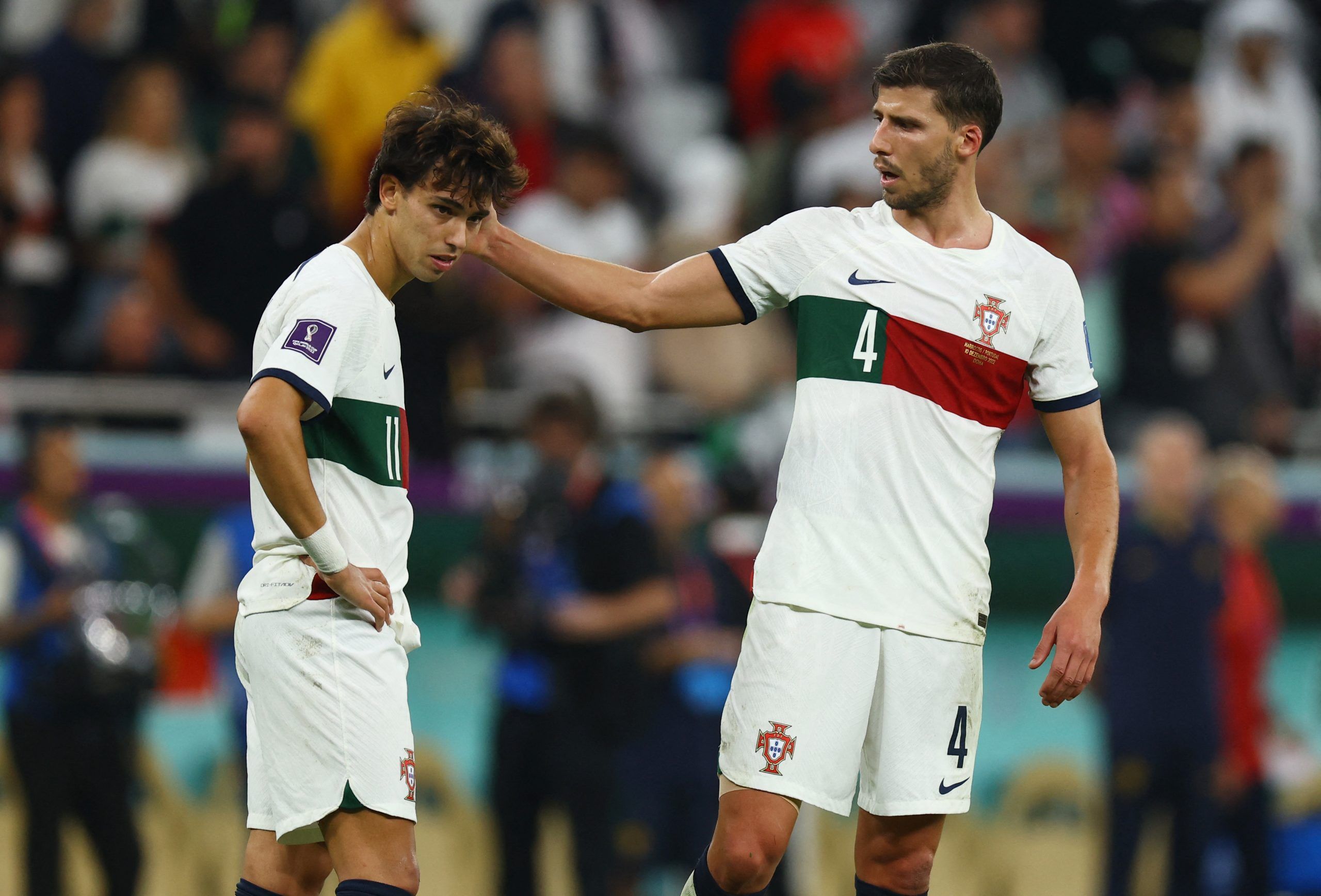 Soccer Football - FIFA World Cup Qatar 2022 - Quarter Final - Morocco v Portugal - Al Thumama Stadium, Doha, Qatar - December 10, 2022 Portugal's Joao Felix looks dejected alongside Ruben Dias after the match as Portugal are eliminated from the World Cup REUTERS/Molly Darlington