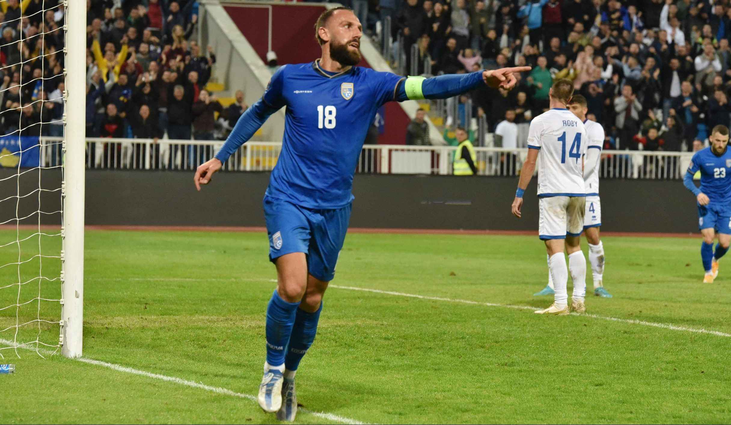 Kosovo's Vedat Muriqi celebrates scoring their fifth goal 