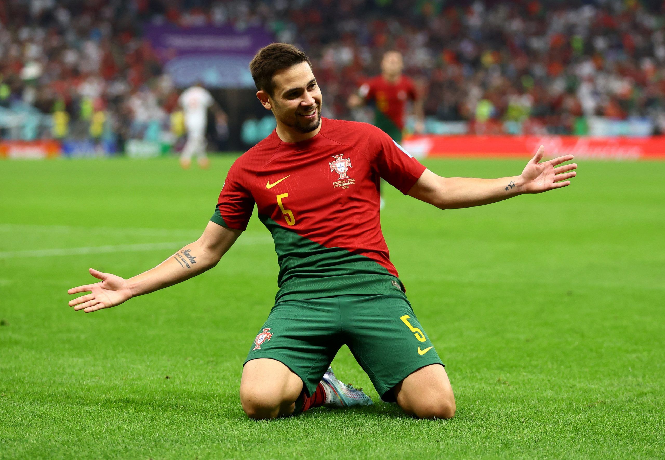 Portugal's Raphael Guerreiro celebrates scoring their fourth goal vs Switzerland in last-16 of the World Cup