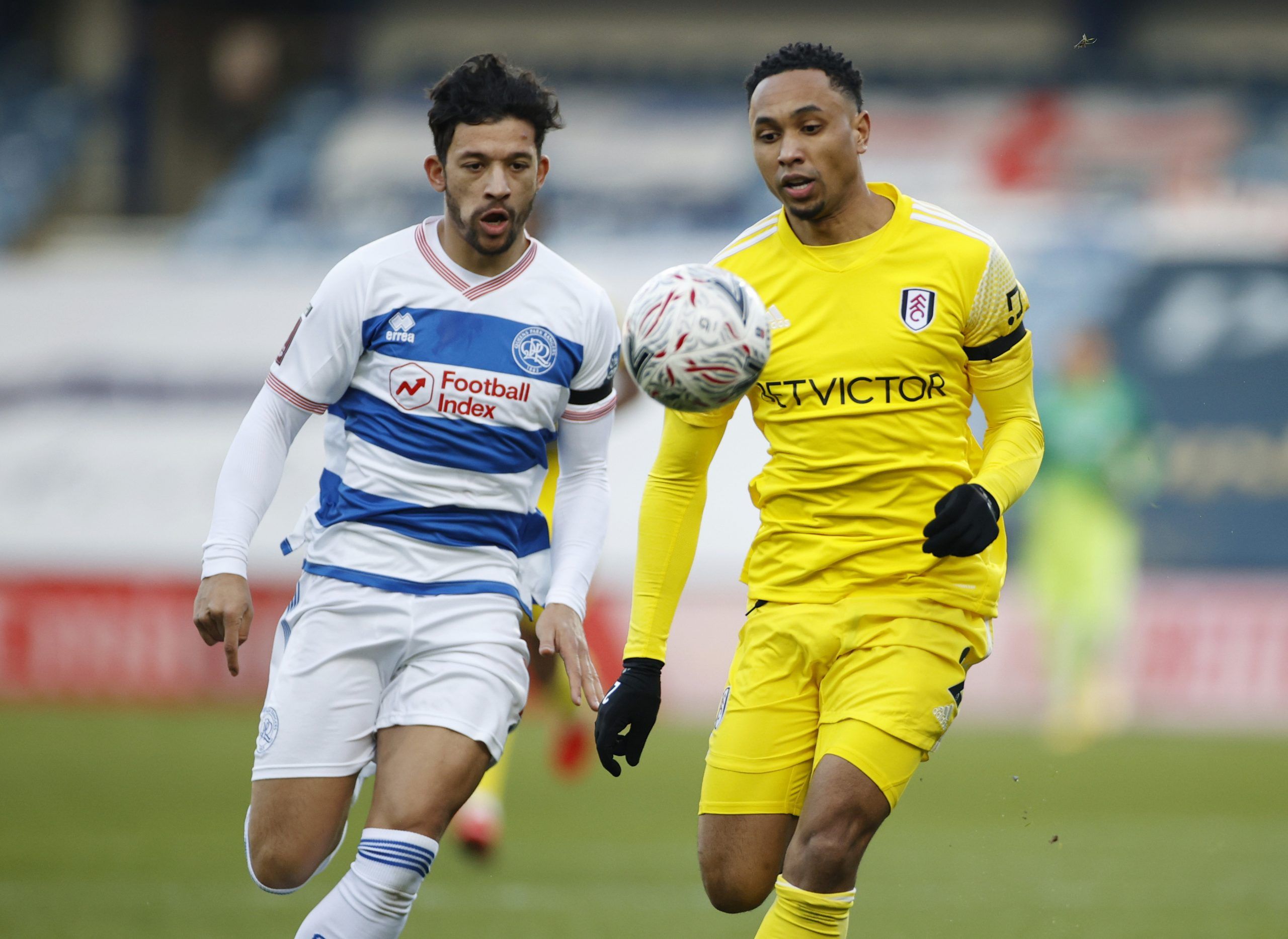 Soccer Football - FA Cup - Third Round - Queens Park Rangers v Fulham - Loftus Road, London, Britain - January 9, 2021 Fulham's Kenny Tete in action with Queens Park Rangers' Macauley Bonne Action Images via Reuters/John Sibley