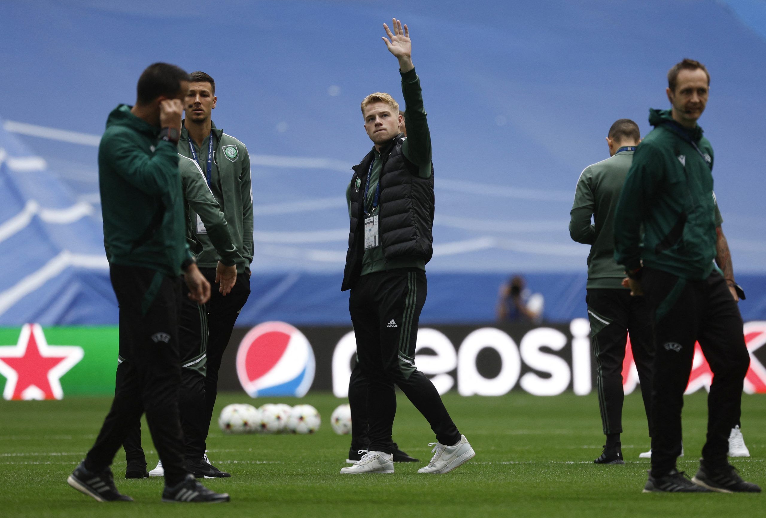 Soccer Football - Champions League - Group F - Real Madrid v Celtic - Santiago Bernabeu, Madrid, Spain - November 2, 2022 Celtic's Stephen Welsh with teammates on the pitch inside the stadium before the match REUTERS/Susana Vera