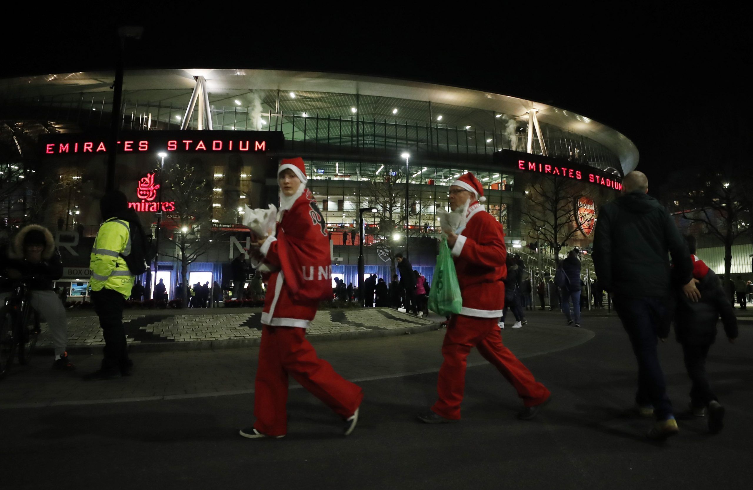 Soccer Football - Carabao Cup - Quarter Final - Arsenal v Sunderland - Emirates Stadium, London, Britain - December 21, 2021 Sunderland fans dressed as Santa outside the stadium before the match Action Images via Reuters/Lee Smith EDITORIAL USE ONLY. No use with unauthorized audio, video, data, fixture lists, club/league logos or 'live' services. Online in-match use limited to 75 images, no video emulation. No use in betting, games or single club /league/player publications.  Please contact your