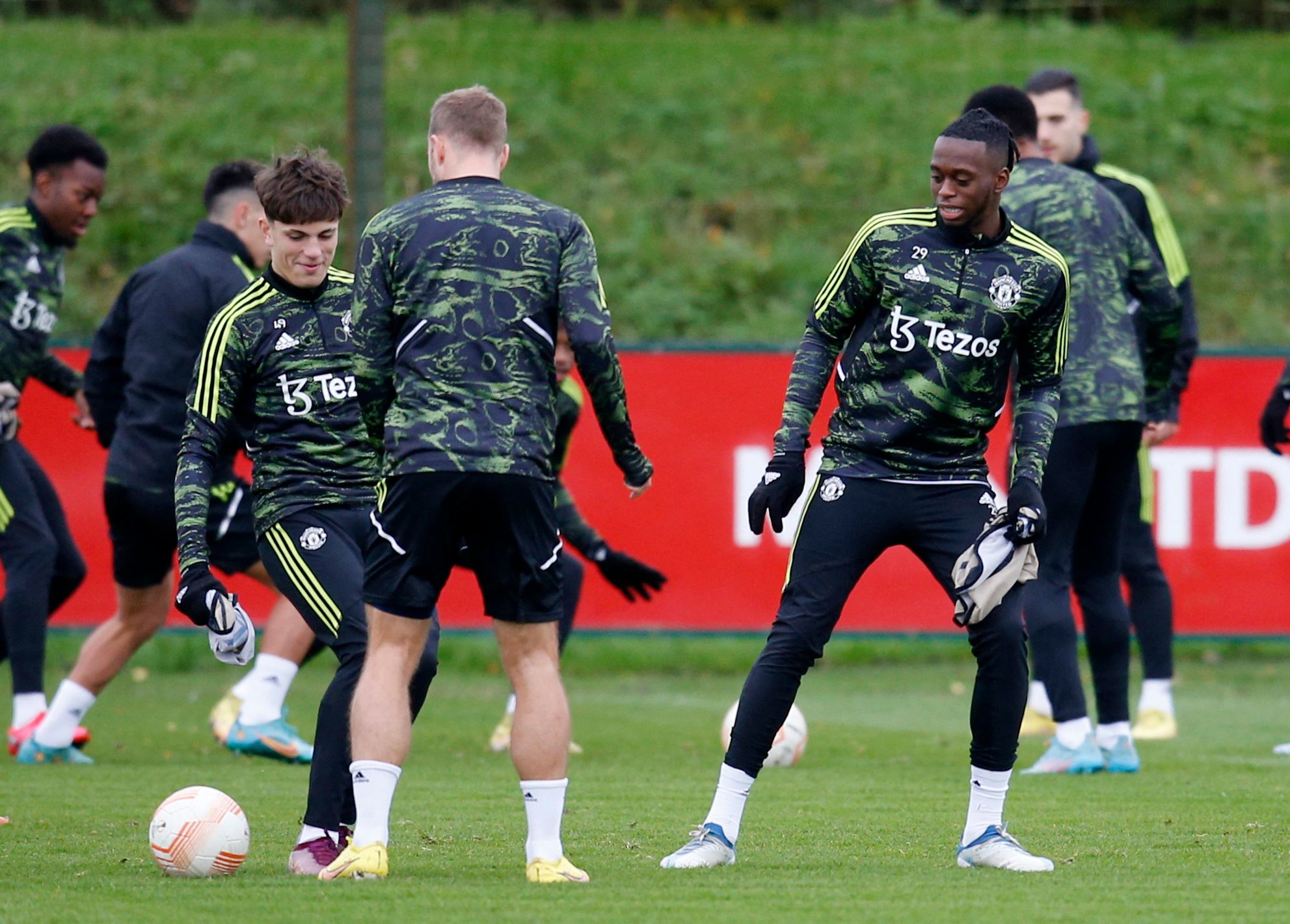 Soccer Football - Europa League - Manchester United Training - Aon Training Complex, Manchester, Britain - November 2, 2022 Manchester United's Aaron Wan-Bissaka and Alejandro Garnacho during training Action Images via Reuters/Ed Sykes