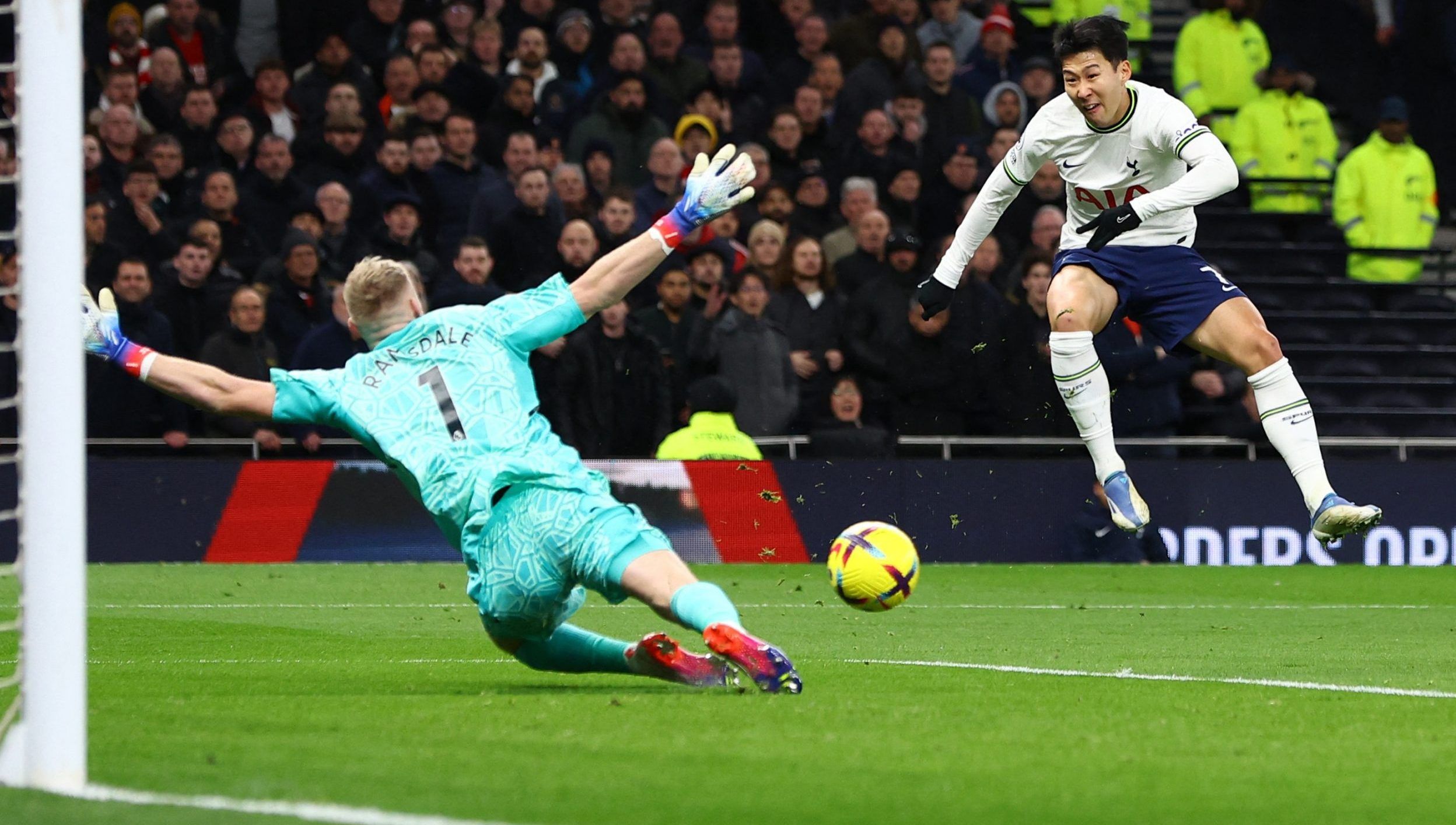 Arsenal's Aaron Ramsdale saves from Tottenham Hotspur's Son Heung-min