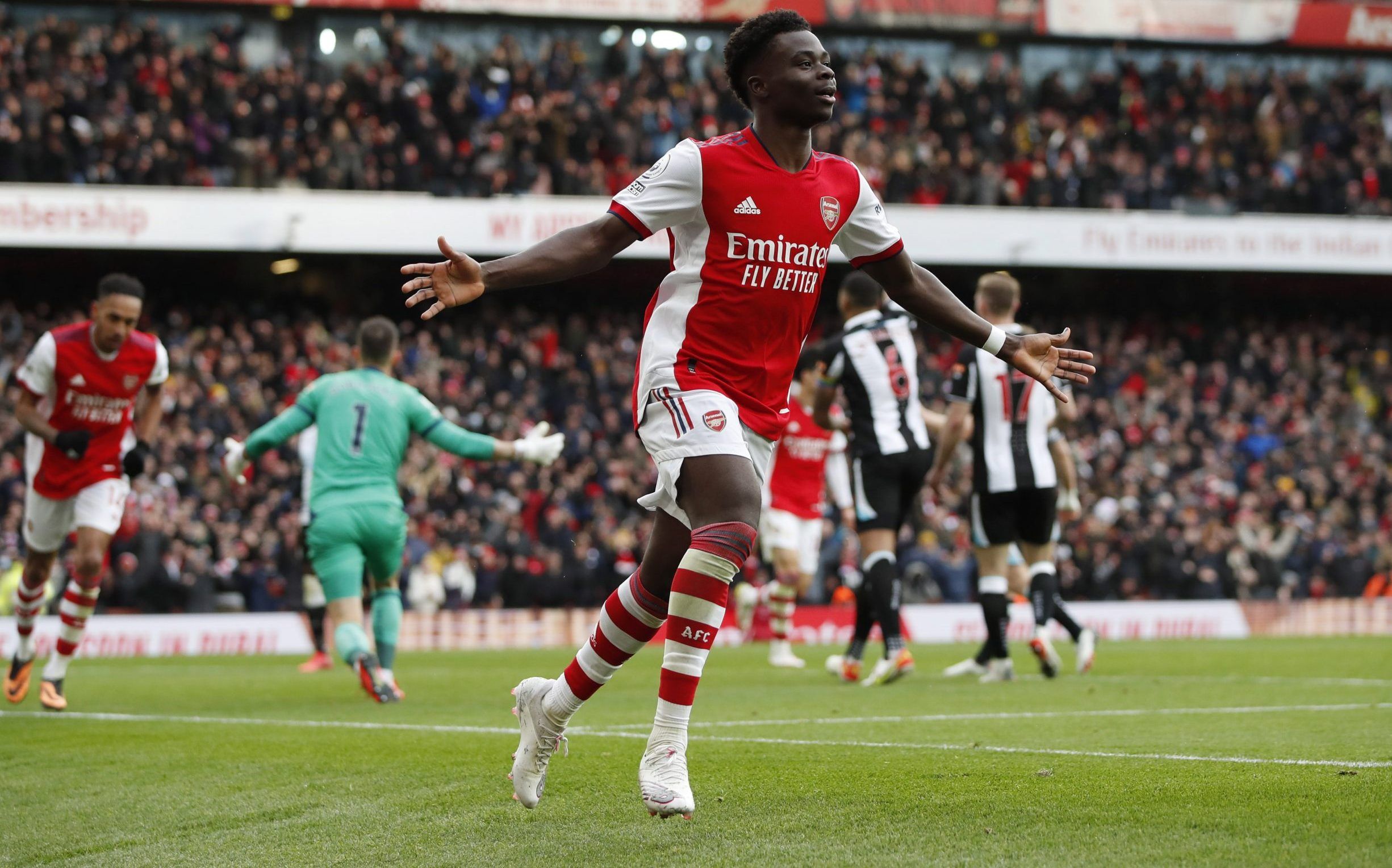 Arsenal's Bukayo Saka celebrates scoring their first goal vs Newcastle United