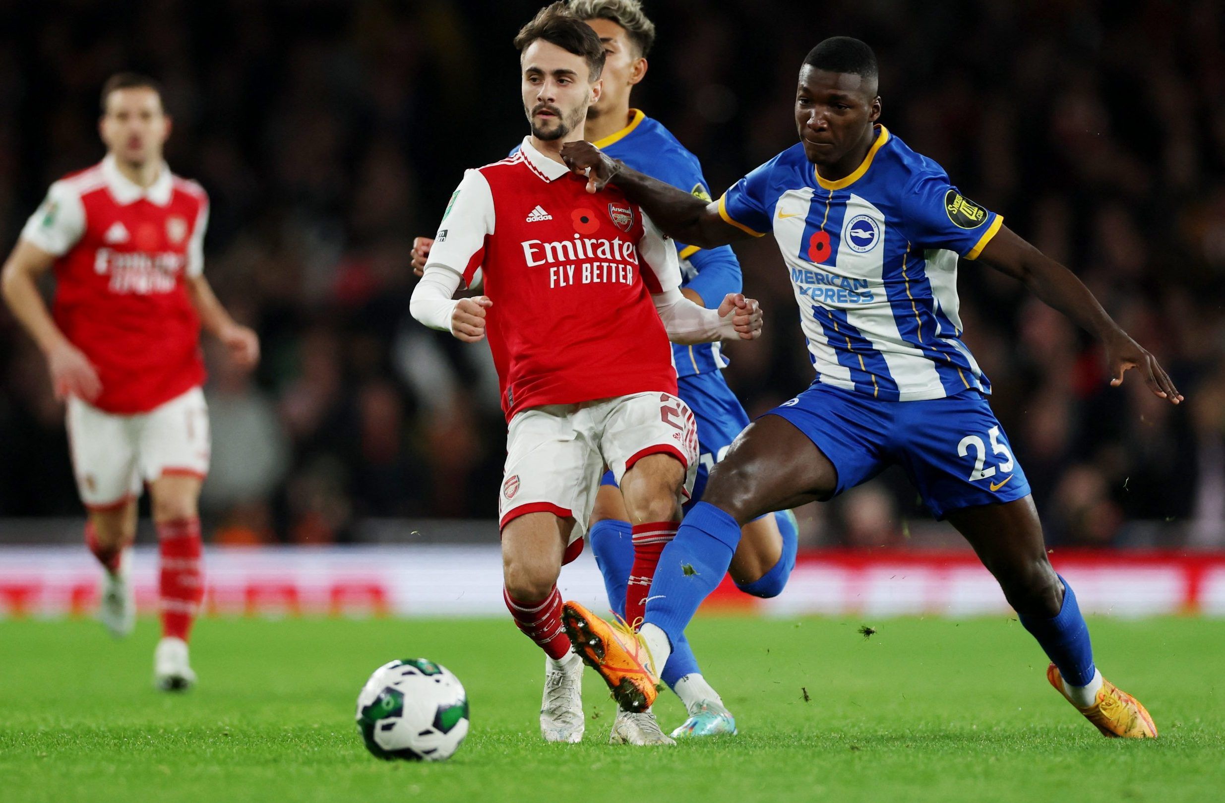 Arsenal's Fabio Vieira in action with Brighton & Hove Albion's Moises Caicedo