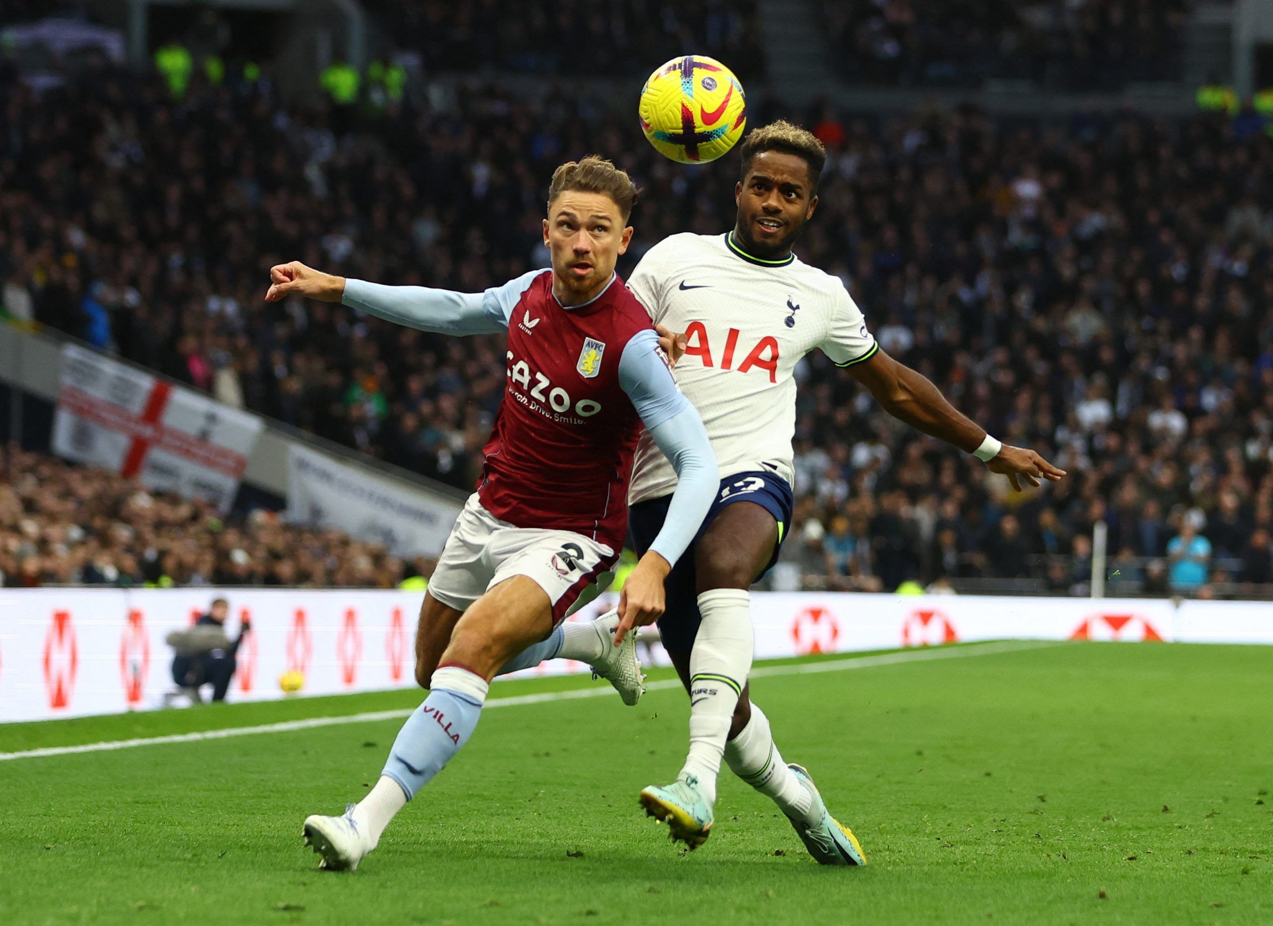 Soccer Football - Premier League - Tottenham Hotspur v Aston Villa - Tottenham Hotspur Stadium, London, Britain - January 1, 2023 Aston Villa's Matty Cash in action with Tottenham Hotspur's Ryan Sessegnon Action Images via Reuters/Paul Childs EDITORIAL USE ONLY. No use with unauthorized audio, video, data, fixture lists, club/league logos or 'live' services. Online in-match use limited to 75 images, no video emulation. No use in betting, games or single club /league/player publications.  Please 