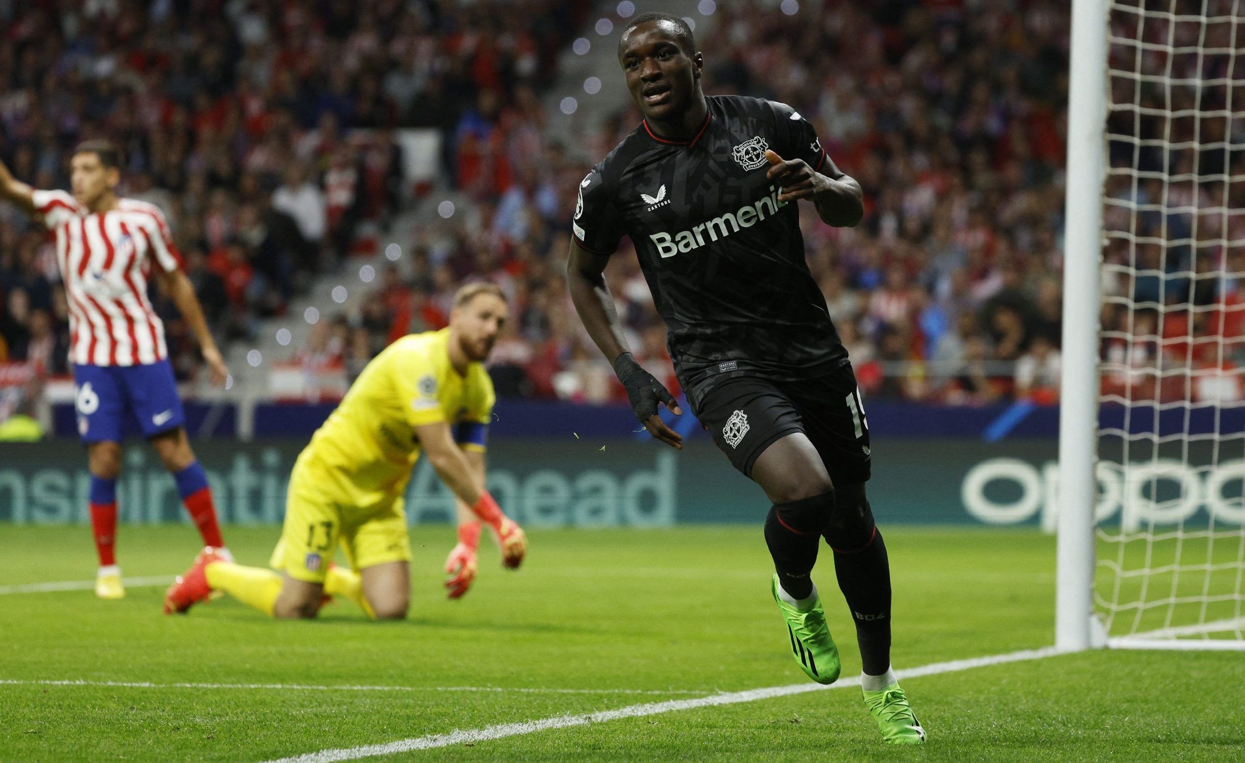 Bayer Leverkusen's Moussa Diaby celebrates scoring their first goal