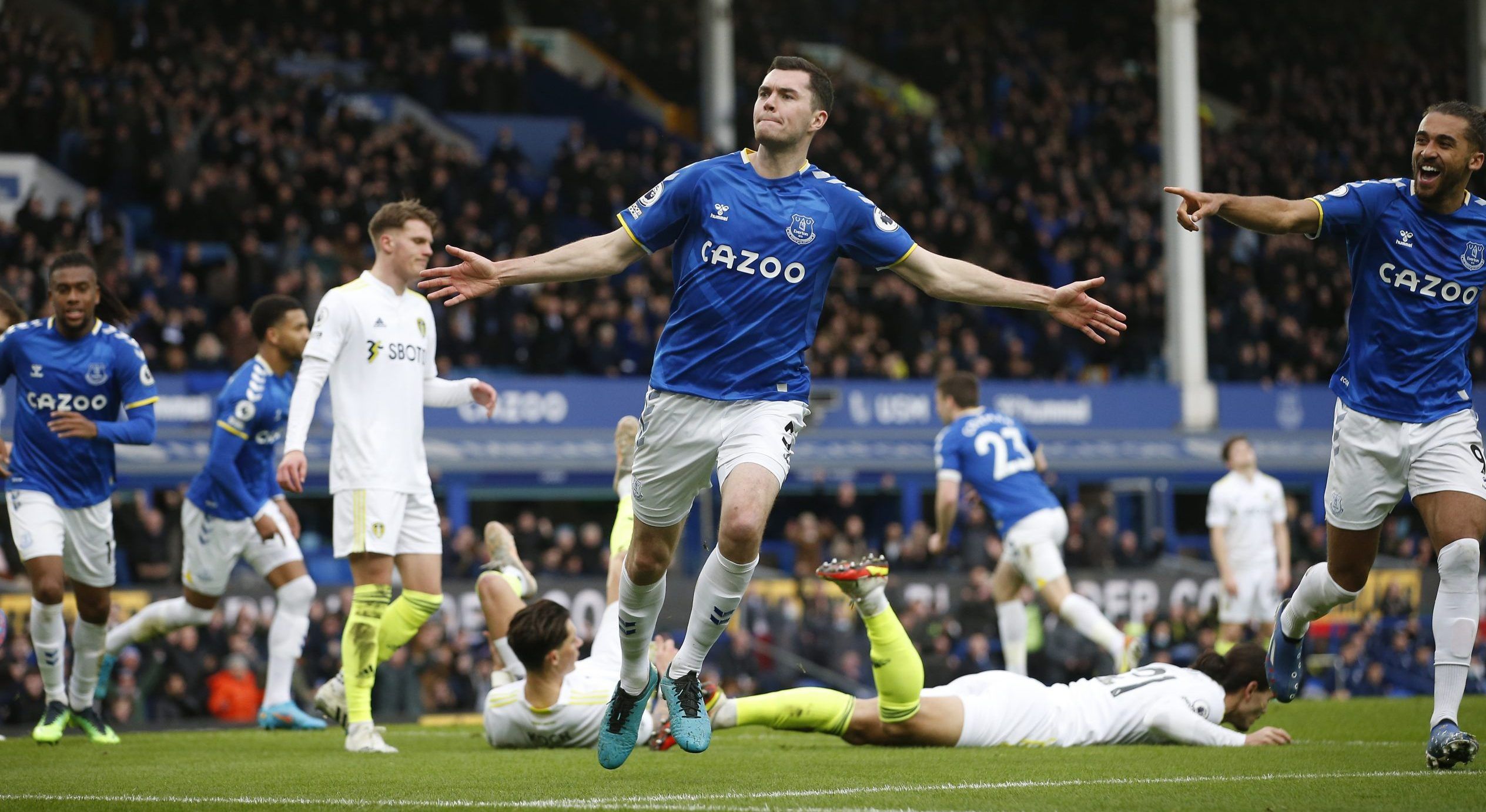 Soccer Football - Premier League - Everton v Leeds United - Goodison Park, Liverpool, Britain - February 12, 2022 Everton's Michael Keane celebrates scoring their second goal REUTERS/Craig Brough EDITORIAL USE ONLY. No use with unauthorized audio, video, data, fixture lists, club/league logos or 'live' services. Online in-match use limited to 75 images, no video emulation. No use in betting, games or single club /league/player publications.  Please contact your account representative for further