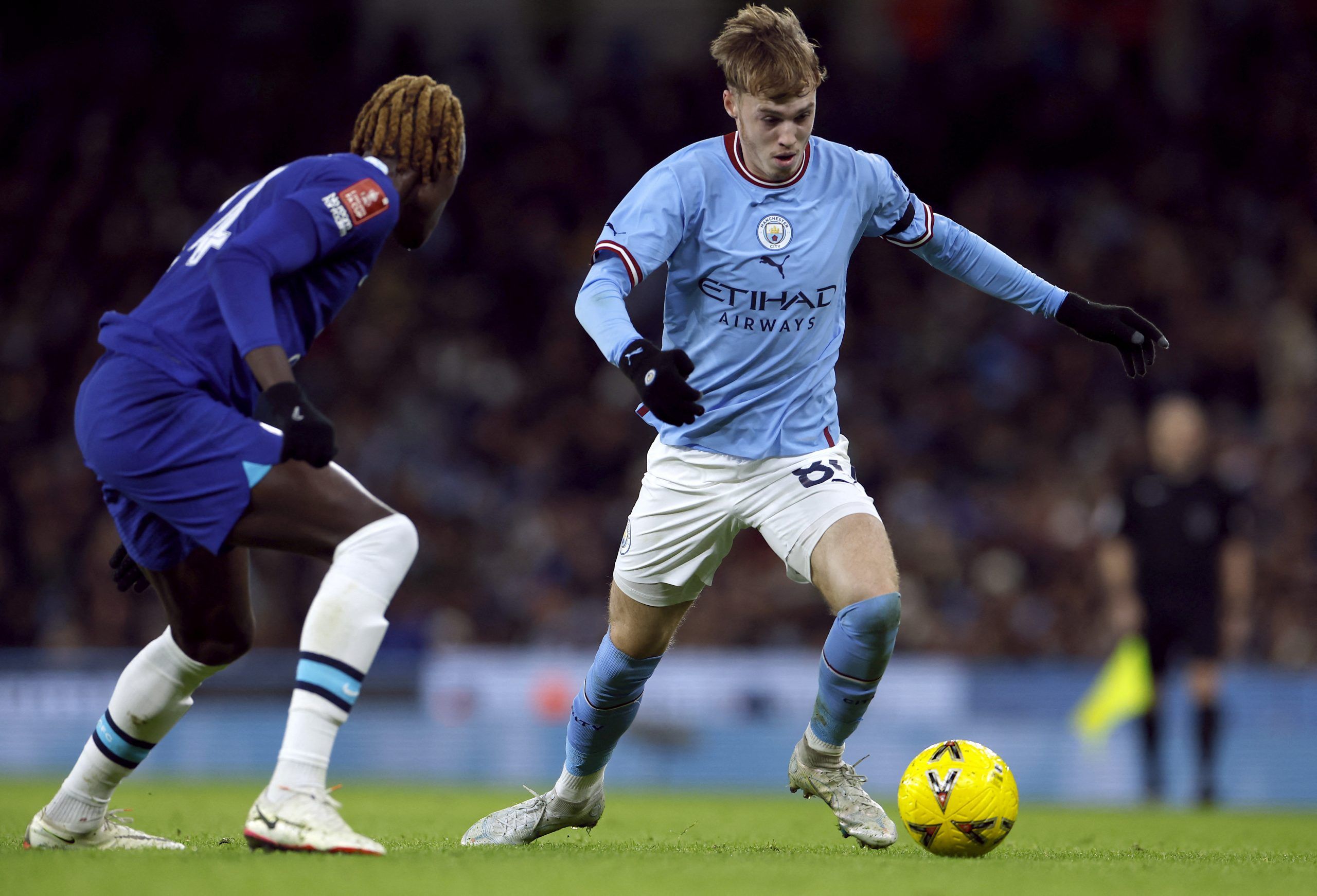 Soccer Football - FA Cup Third Round - Manchester City v Chelsea - Etihad Stadium, Manchester, Britain - January 8, 2023 Manchester City's Cole Palmer in action with Chelsea's Trevoh Chalobah Action Images via Reuters/Jason Cairnduff