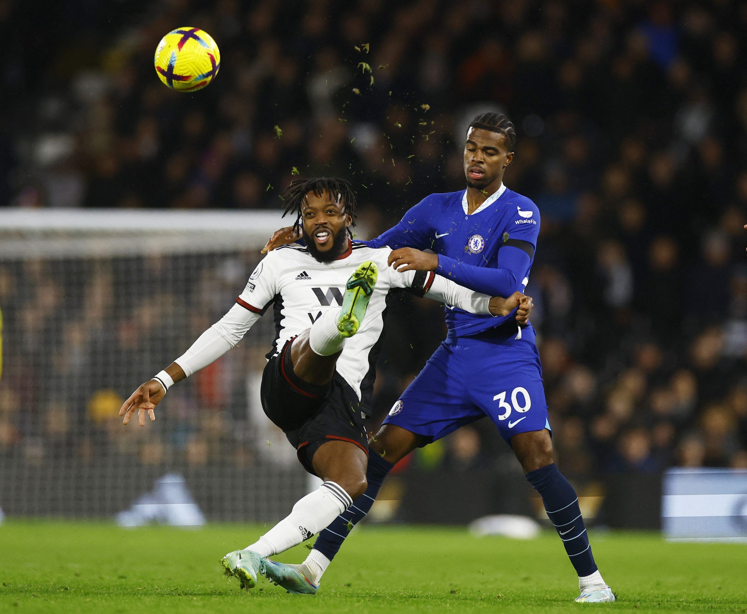 Soccer Football - Premier League - Fulham v Chelsea - Craven Cottage, London, Britain - January 12, 2023 Fulham's Nathaniel Chalobah in action with Chelsea's Carney Chukwuemeka Action Images via Reuters/Peter Cziborra EDITORIAL USE ONLY. No use with unauthorized audio, video, data, fixture lists, club/league logos or 'live' services. Online in-match use limited to 75 images, no video emulation. No use in betting, games or single club /league/player publications.  Please contact your account repr