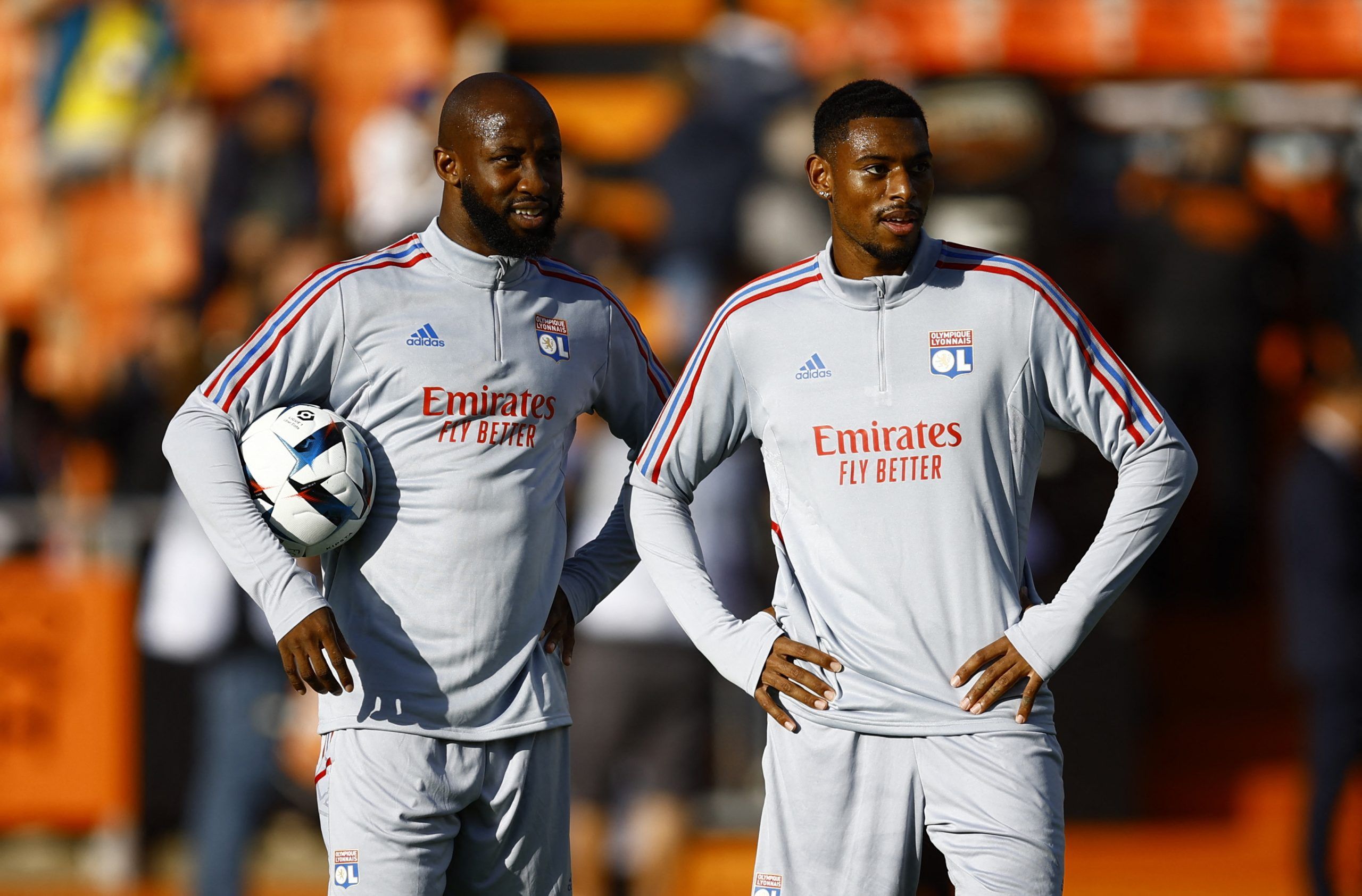 Soccer Football - Ligue 1 - Lorient v Olympique Lyonnais - Stade du Moustoir, Lorient, France - September 7, 2022 Olympique Lyonnais' Moussa Dembele and Jeff Reine-Adelaide during the warm up before the match REUTERS/Stephane Mahe