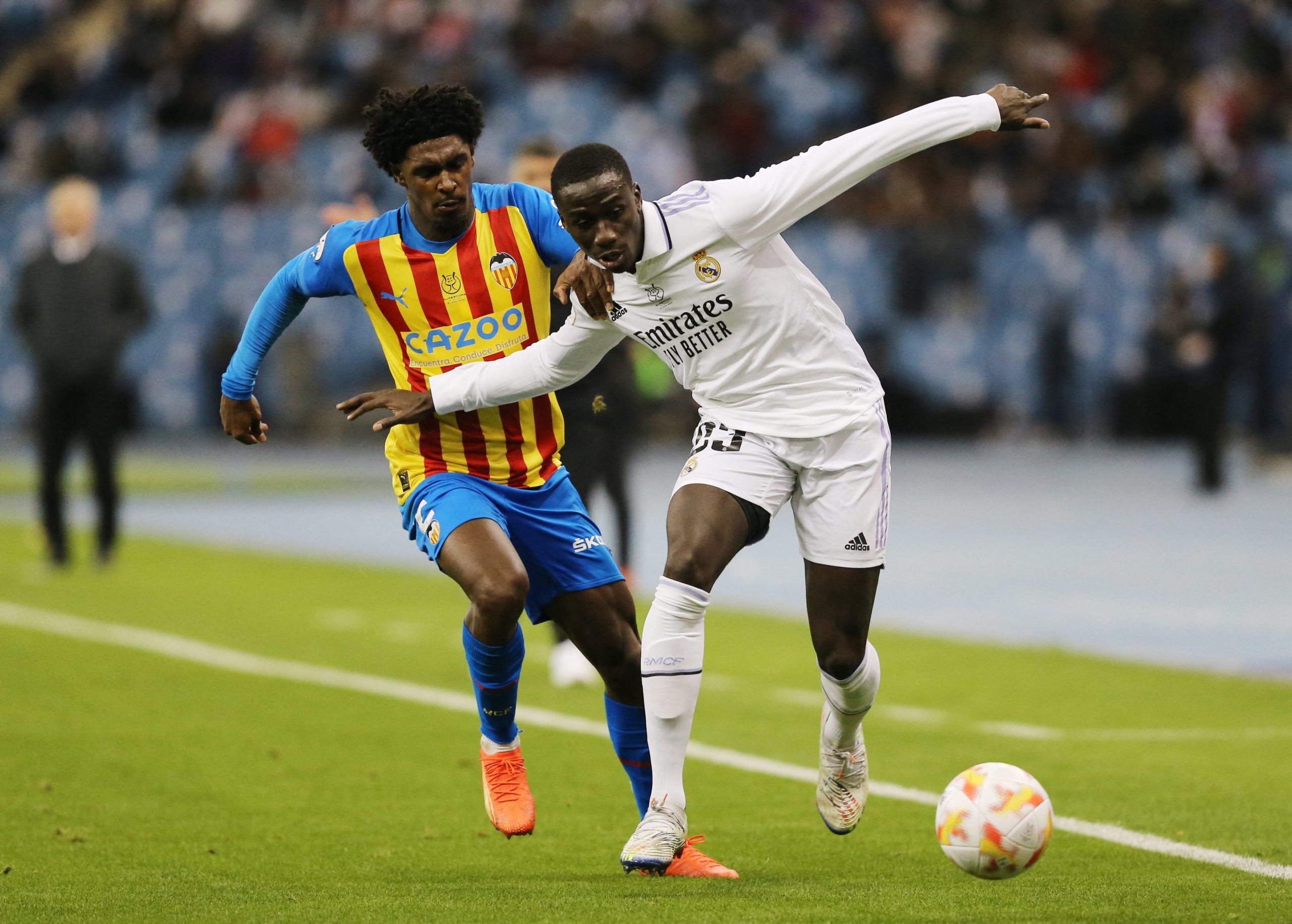 Real Madrid's Ferland Mendy in action with Valencia's Thierry Correia 
