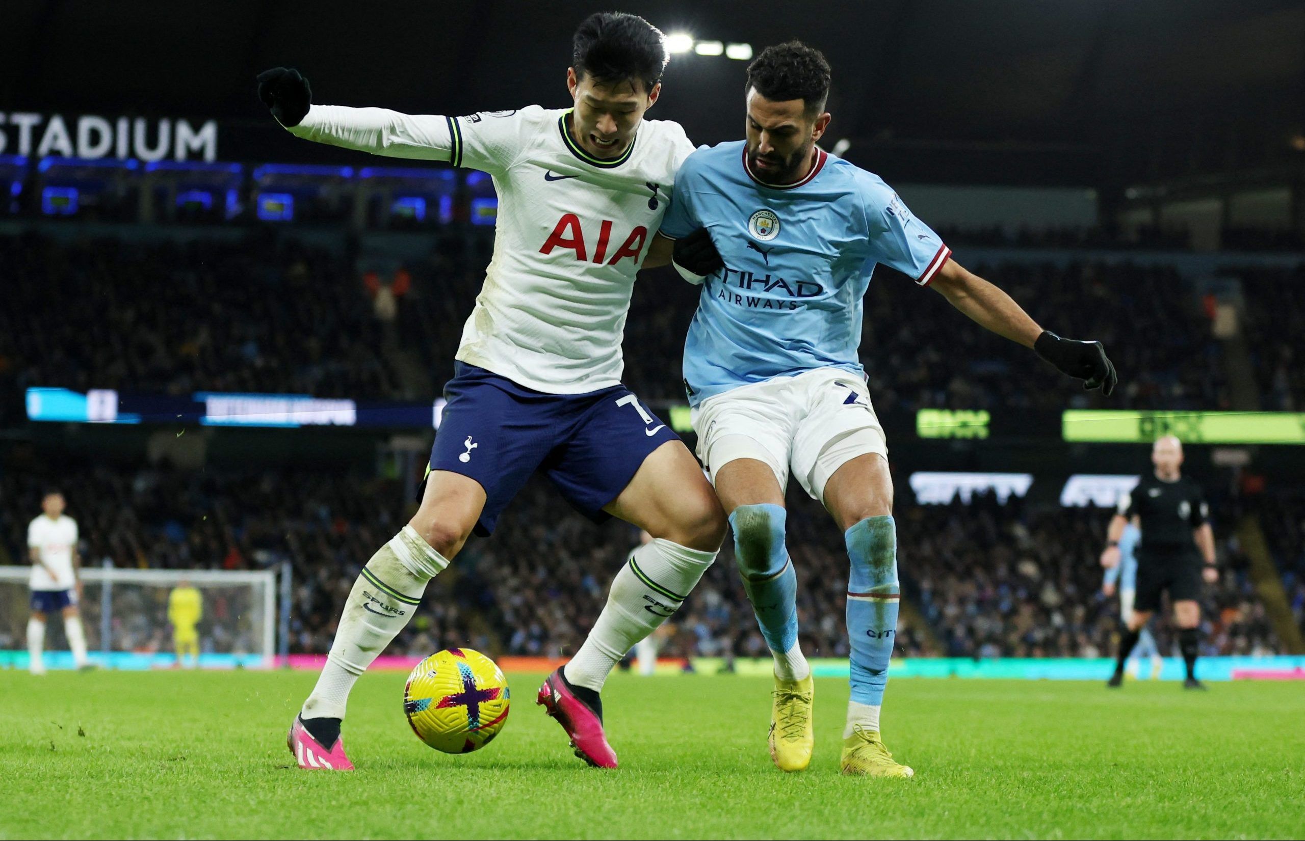 Soccer Football - Premier League - Manchester City v Tottenham Hotspur - Etihad Stadium, Manchester, Britain - January 19, 2023 Tottenham Hotspur's Son Heung-min in action with Manchester City's Riyad Mahrez Action Images via Reuters/Lee Smith EDITORIAL USE ONLY. No use with unauthorized audio, video, data, fixture lists, club/league logos or 'live' services. Online in-match use limited to 75 images, no video emulation. No use in betting, games or single club /league/player publications.  Please