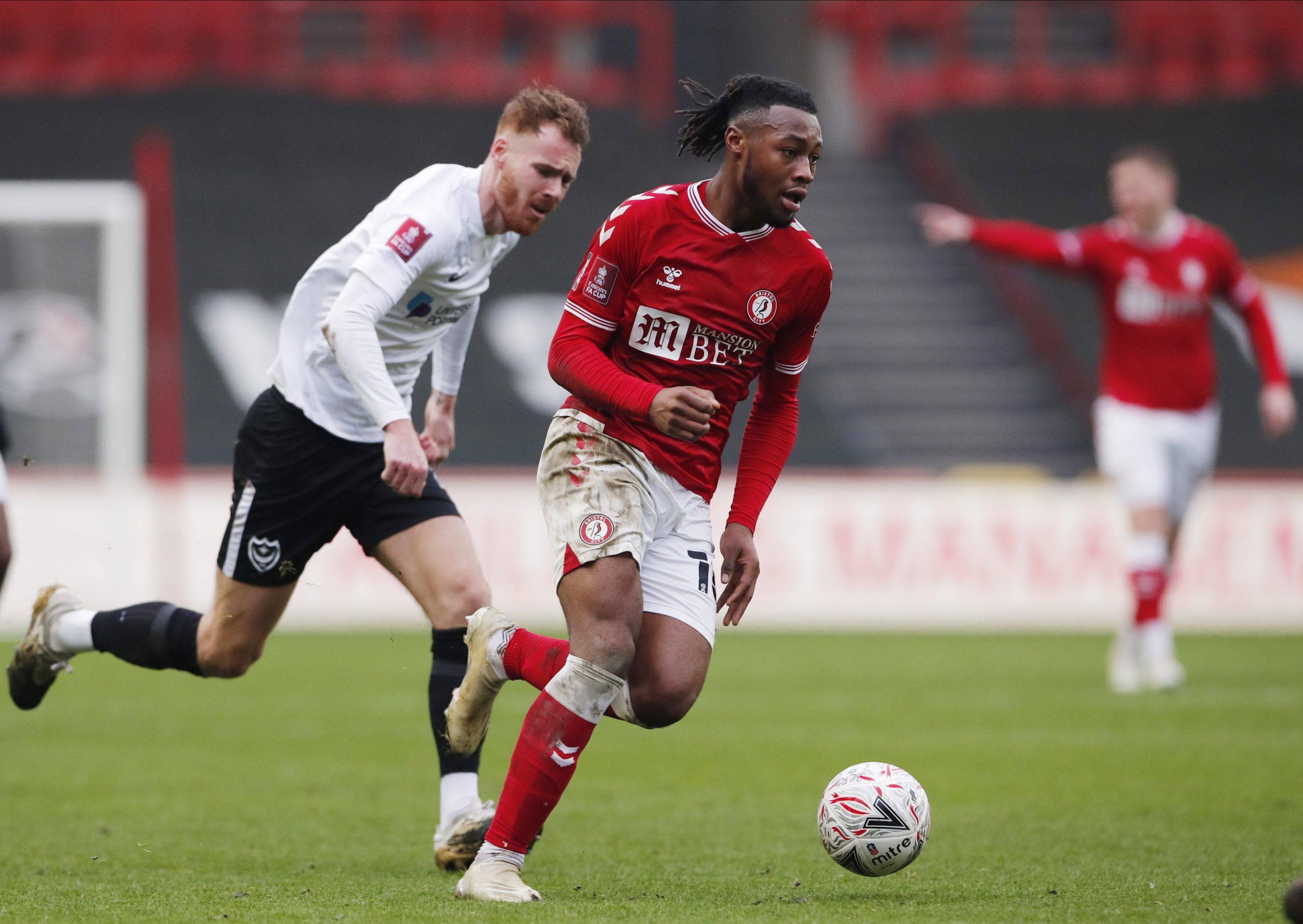 Soccer Football - FA Cup - Third Round - Bristol City v Portsmouth - Ashton Gate Stadium, Bristol, Britain - January 10, 2021 Bristol City's Antoine Semenyo in action with  Portsmouths' Tom Naylor Action Images via Reuters/Andrew Couldridge