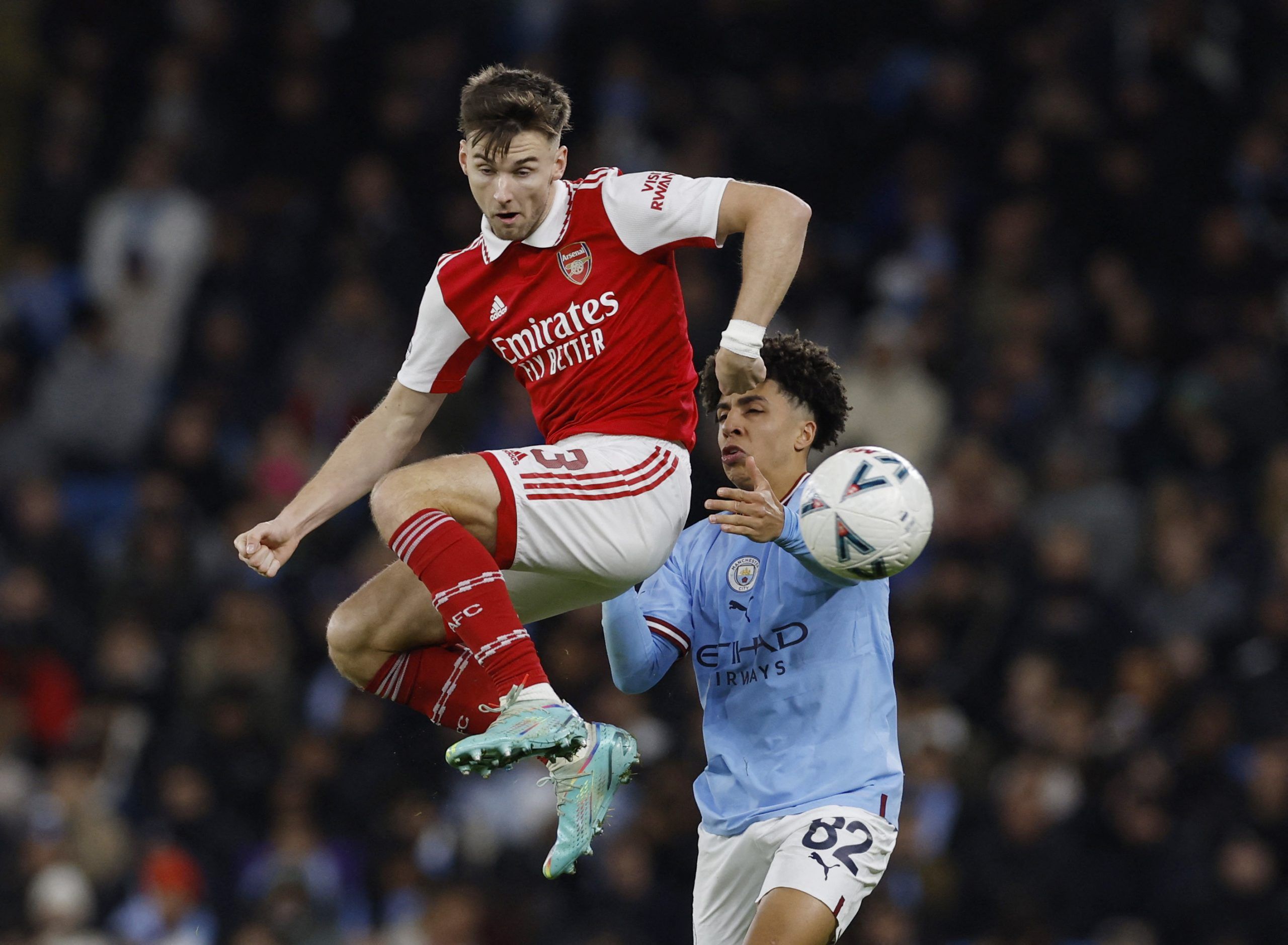 Soccer Football - FA Cup - Fourth Round - Manchester City v Arsenal - Etihad Stadium, Manchester, Britain - January 27, 2023 Arsenal's Kieran Tierney in action with Manchester City's Rico Lewis Action Images via Reuters/Jason Cairnduff
