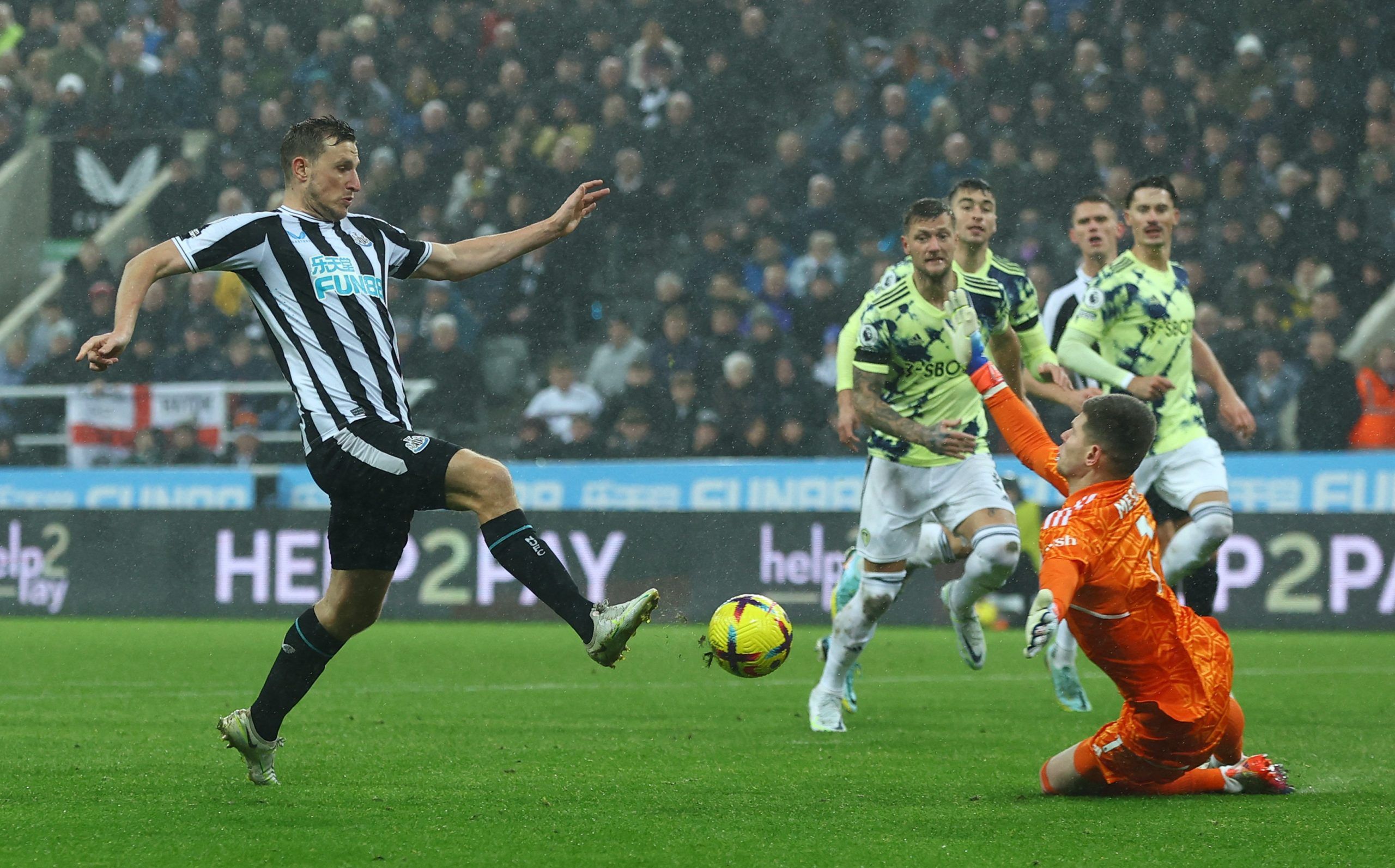 Soccer Football - Premier League - Newcastle United v Leeds United - St James' Park, Newcastle, Britain - December 31, 2022 Leeds United's Illan Meslier saves from Newcastle United's Chris Wood Action Images via Reuters/Lee Smith EDITORIAL USE ONLY. No use with unauthorized audio, video, data, fixture lists, club/league logos or 'live' services. Online in-match use limited to 75 images, no video emulation. No use in betting, games or single club /league/player publications.  Please contact your 
