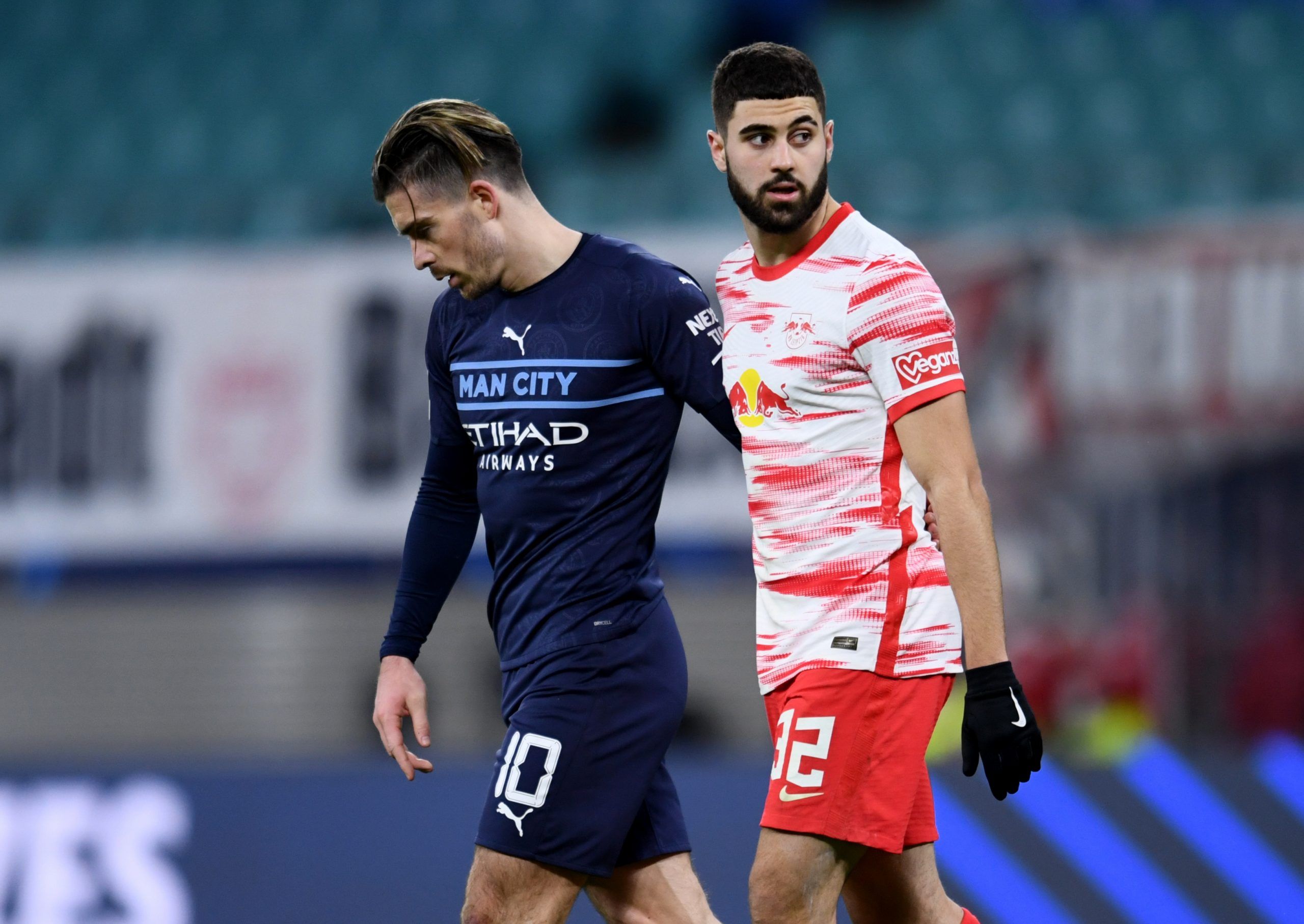 Soccer Football - Champions League - Group A - RB Leipzig v Manchester City - Red Bull Arena, Leipzig, Germany - December 7, 2021 Manchester City's Jack Grealish with RB Leipzig's Josko Gvardiol after the match REUTERS/Annegret Hilse