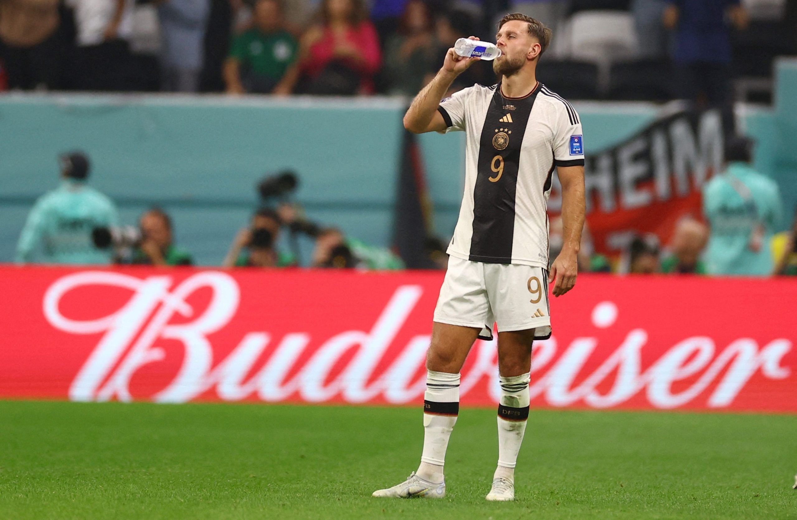 Soccer Football - FIFA World Cup Qatar 2022 - Group E - Costa Rica v Germany - Al Bayt Stadium, Al Khor, Qatar - December 1, 2022 Germany's Niclas Fullkrug looks dejected after the match as Germany are eliminated from the World Cup REUTERS/Kai Pfaffenbach