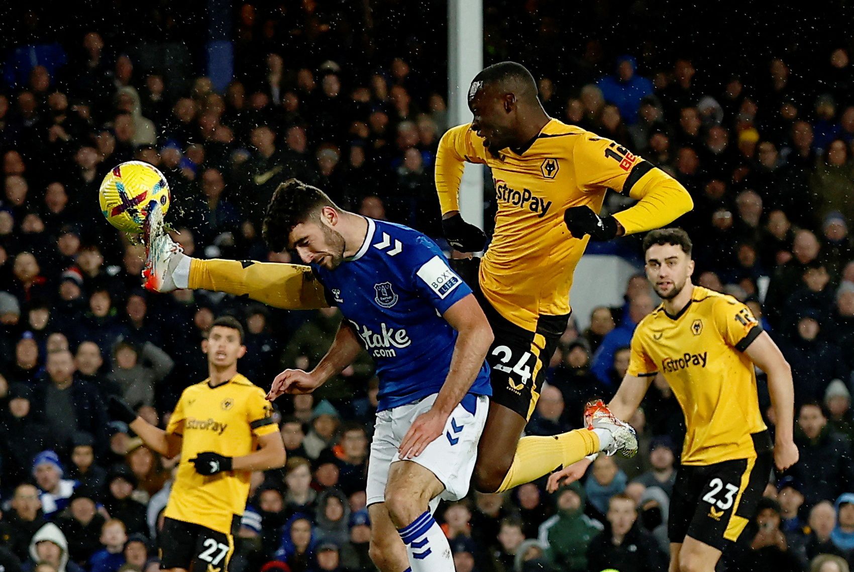Soccer Football - Premier League - Everton v Wolverhampton Wanderers - Goodison Park, Liverpool, Britain - December 26, 2022 Wolverhampton Wanderers' Toti in action with Everton's Thomas Cannon Action Images via Reuters/Jason Cairnduff EDITORIAL USE ONLY. No use with unauthorized audio, video, data, fixture lists, club/league logos or 'live' services. Online in-match use limited to 75 images, no video emulation. No use in betting, games or single club /league/player publications.  Please contact
