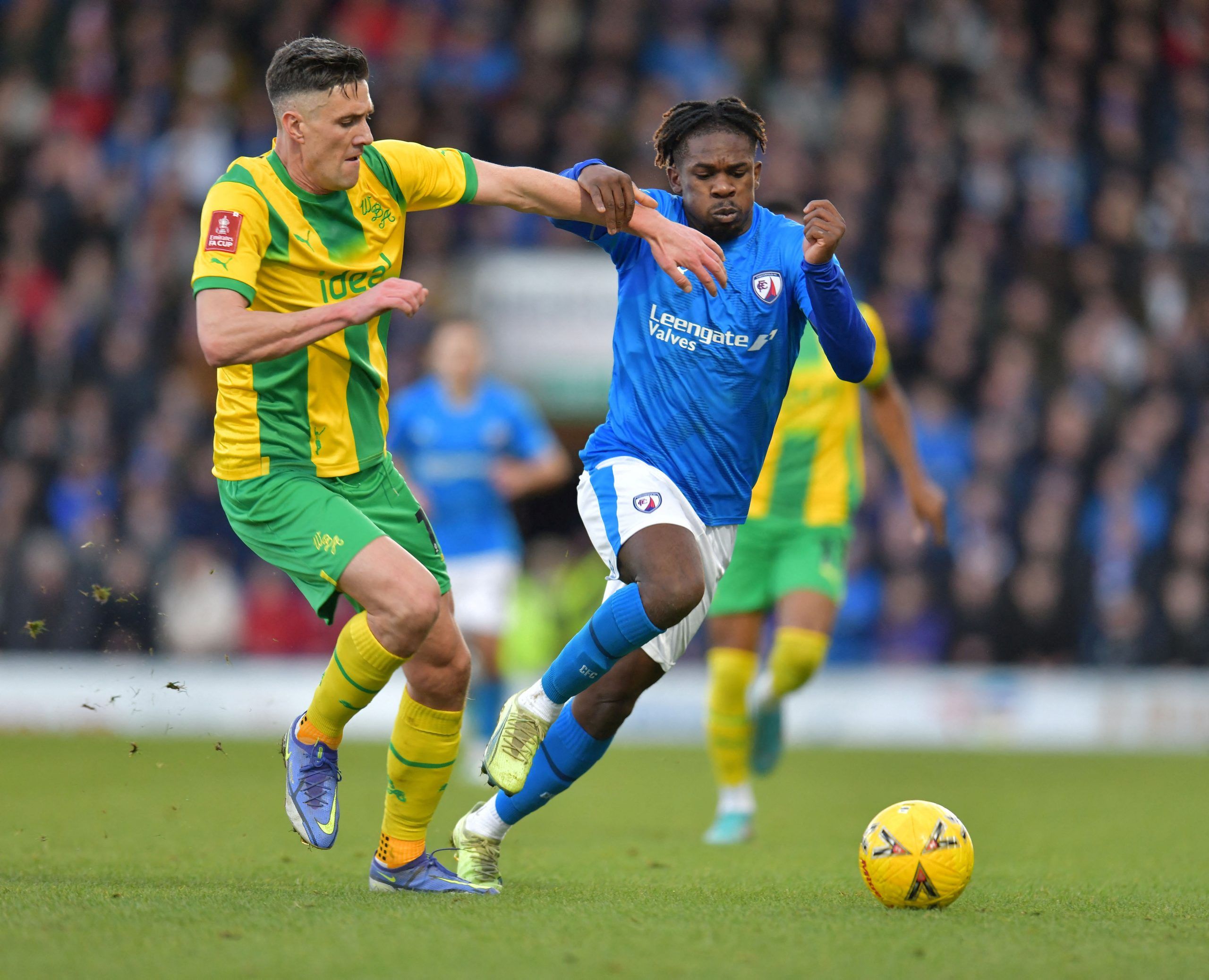 Soccer Football - FA Cup Third Round - Chesterfield v West Bromwich Albion - Proact Stadium, Chesterfield, Britain - January 7, 2023 Chesterfield's Tim Akinola in action with West Bromwich Albion's Martin Kelly  Action Images/Paul Burrows