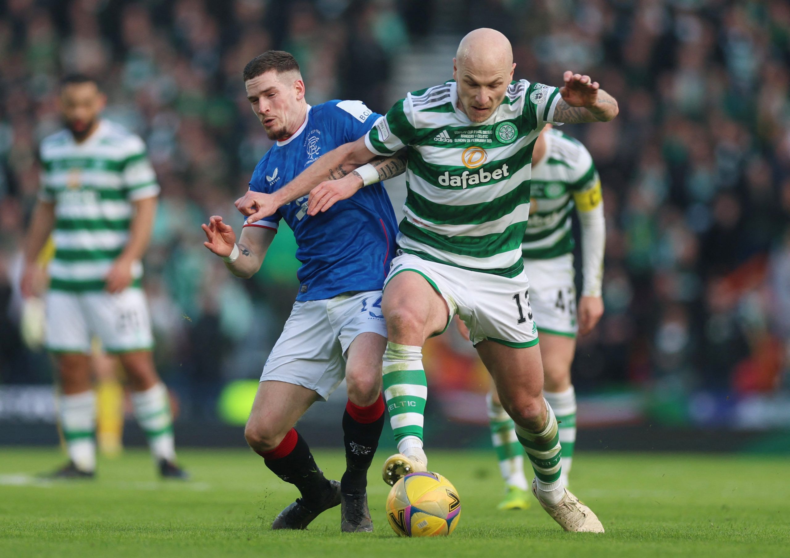 Soccer Football - Scottish League Cup - Final - Rangers v Celtic - Hampden Park, Glasgow, Scotland, Britain - February 26, 2023 Celtic's Aaron Mooy in action with Rangers' Ryan Kent Action Images via Reuters/Lee Smith