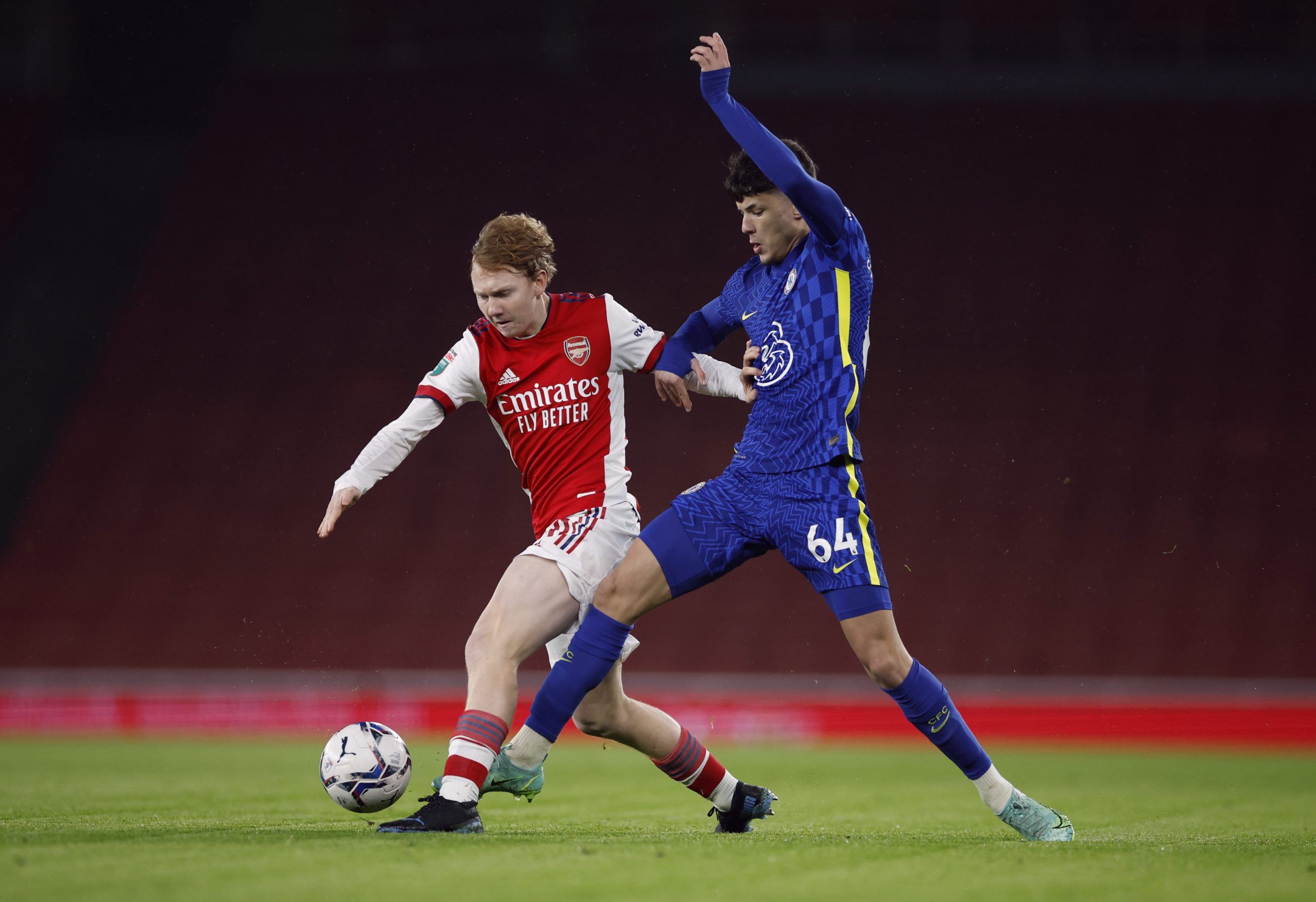 Arsenal U21's Jack Francis in action with Chelsea U21's Jude Soonsup-Bell 
