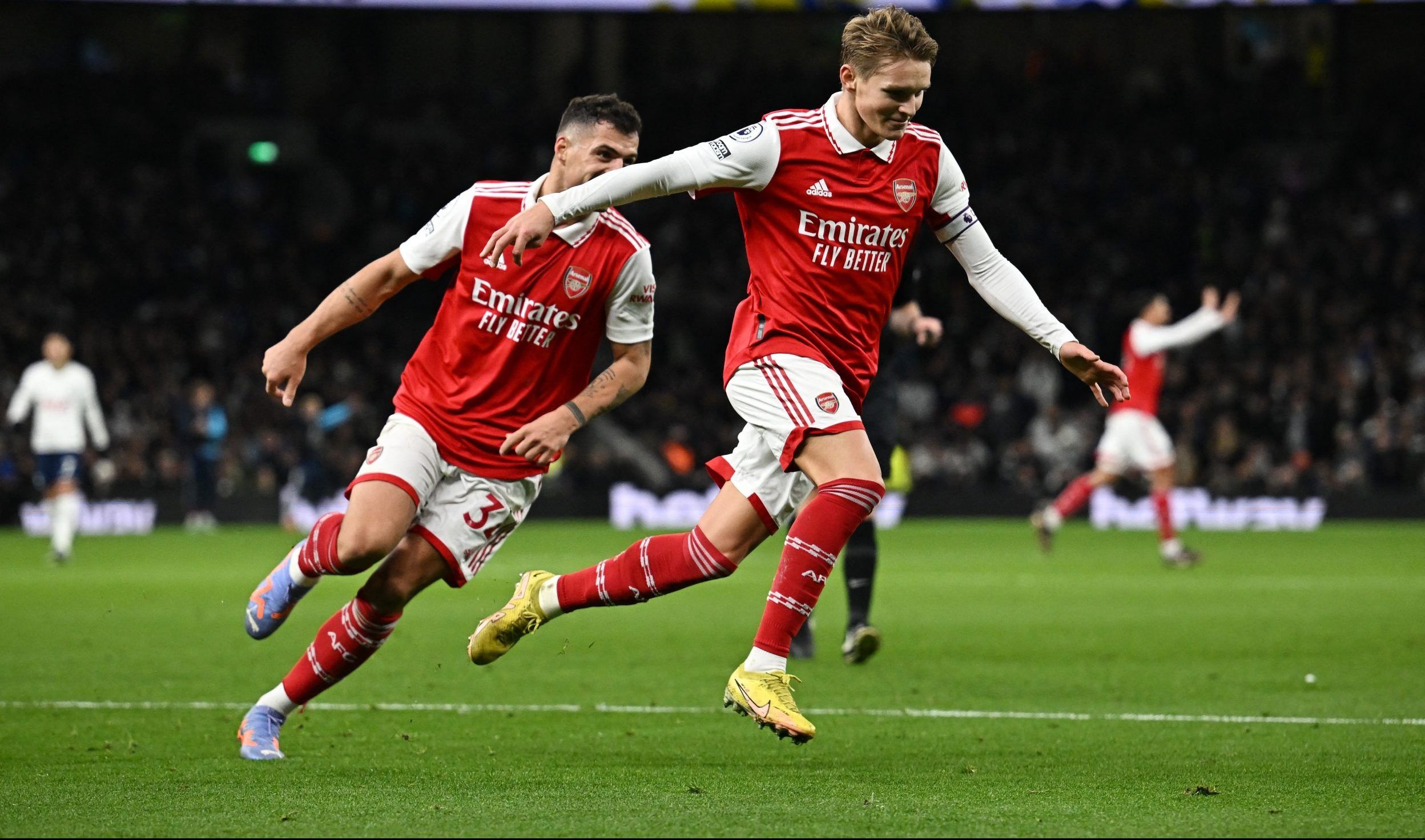 Arsenal's Martin Odegaard celebrates scoring their second goal with Granit Xhaka