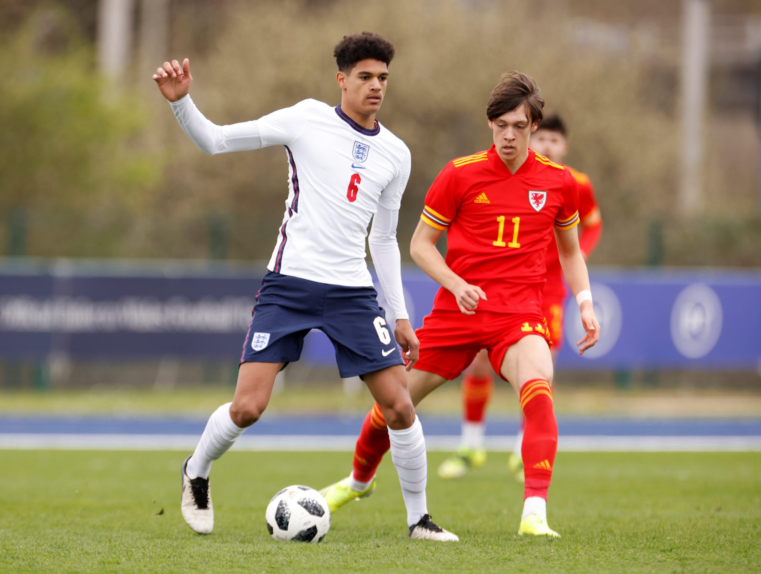 Soccer Football - Under 18 International Friendly - Wales v England - Cardiff International Sports Campus, Cardiff, Wales, Britain - March 29, 2021 England under 18's Jarell Quansah in action with Wales under 18's Chris Popov  Action Images/John Sibley