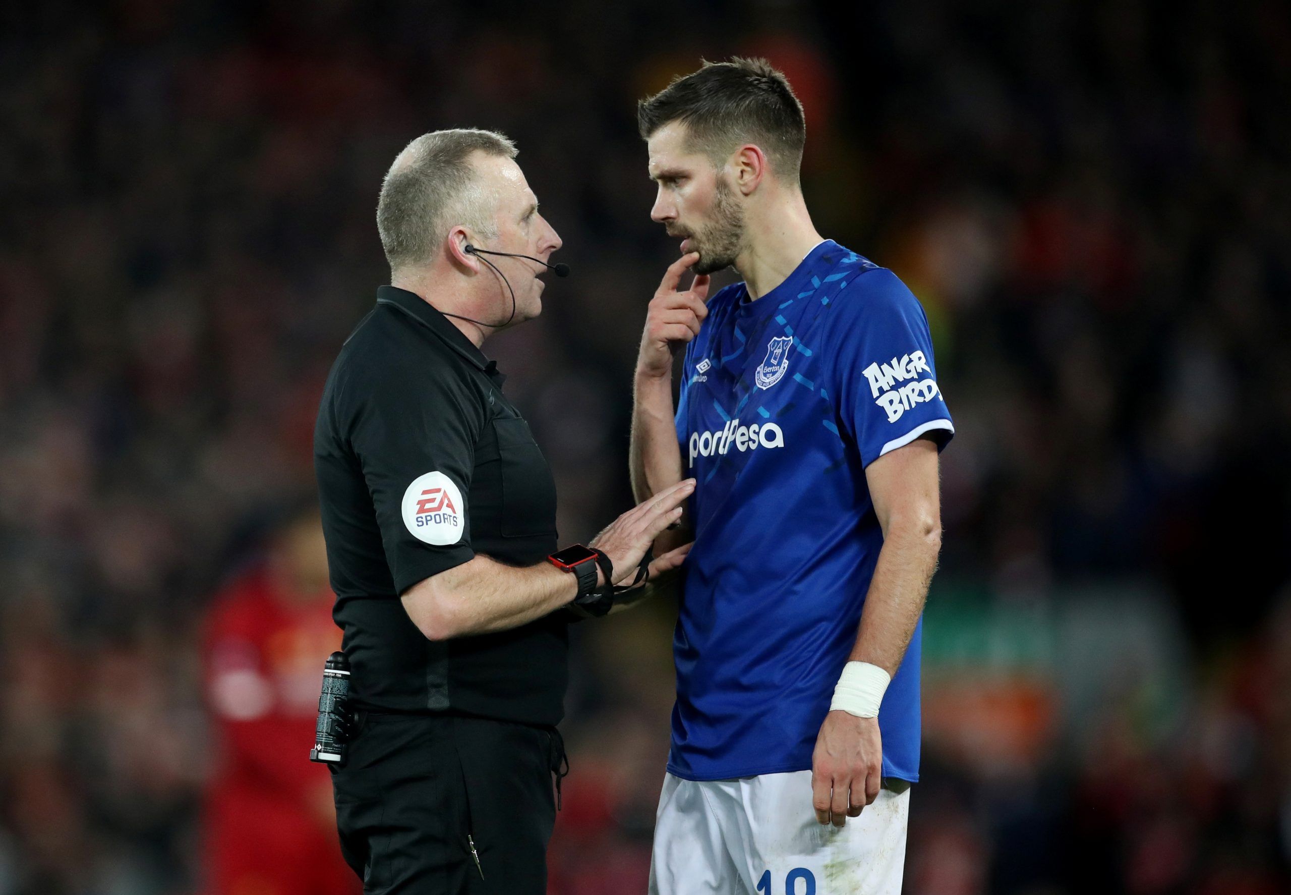 Soccer Football - FA Cup - Third Round - Liverpool v Everton - Anfield, Liverpool, Britain - January 5, 2020  Everton's Morgan Schneiderlin with referee Jonathan Moss  Action Images via Reuters/Carl Recine
