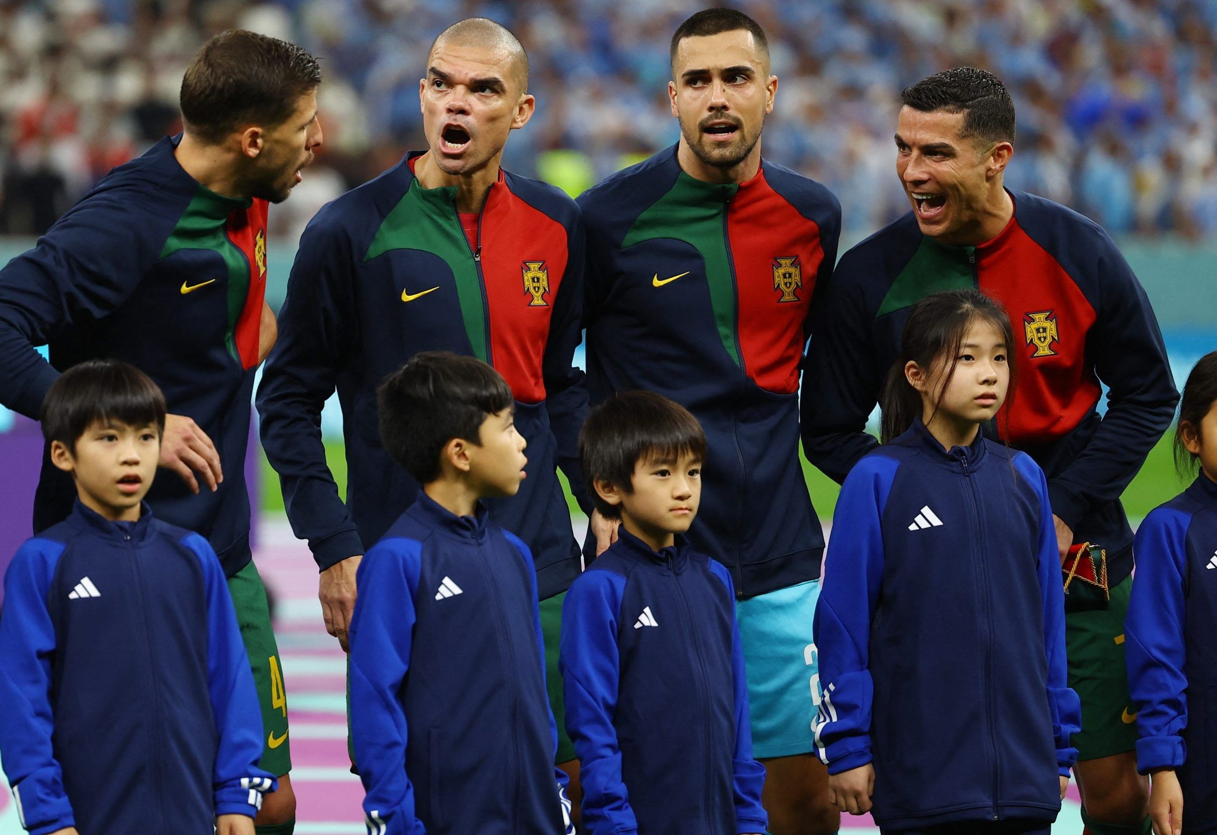  Portugal's Ruben Dias, Pepe, Diogo Costa and Cristiano Ronaldo line up before the match