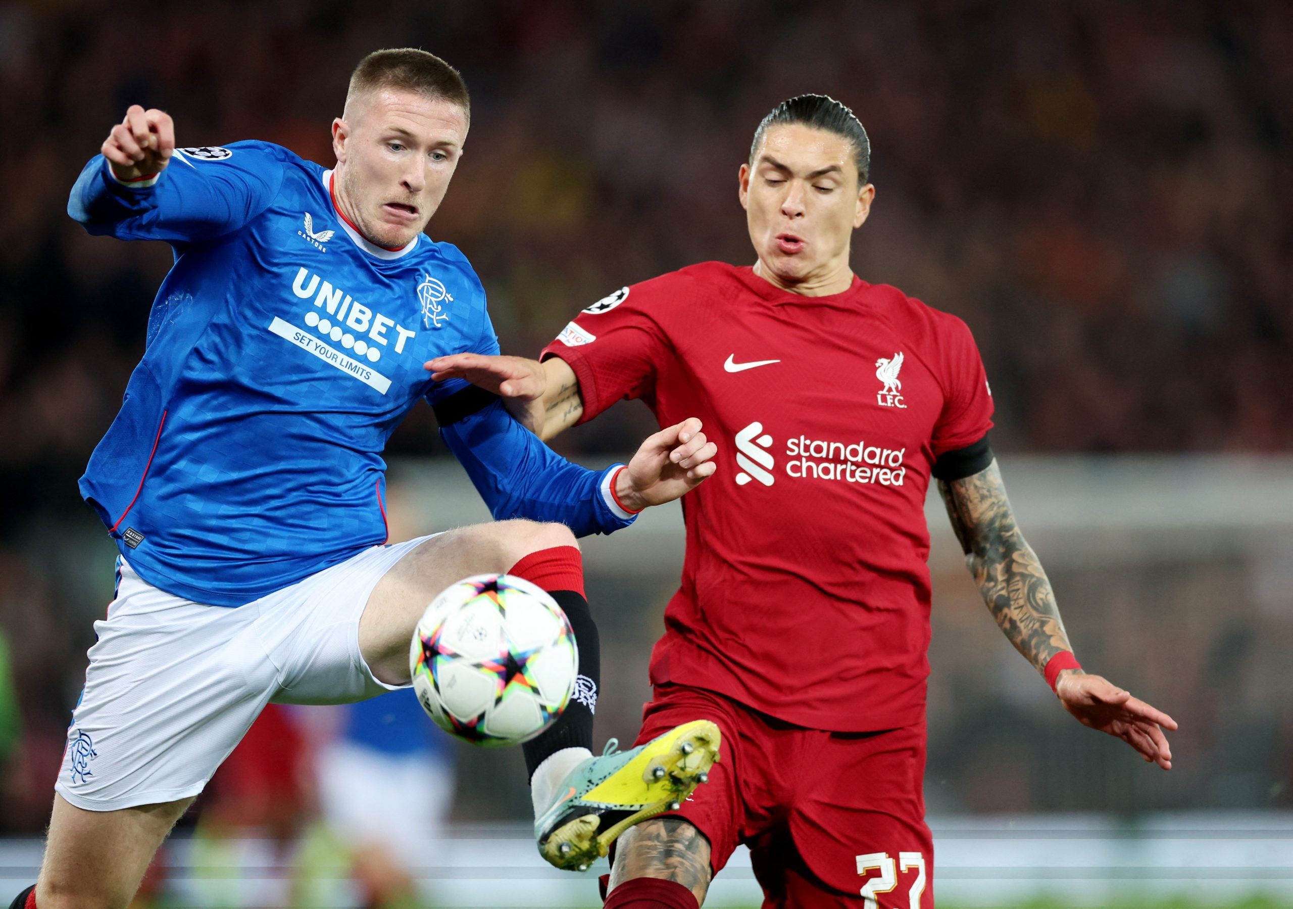 Soccer Football - Champions League - Group A - Liverpool v Rangers - Anfield, Liverpool, Britain - October 4, 2022   Rangers' John Lundstram in action with Liverpool's Darwin Nunez Action Images via Reuters/Carl Recine