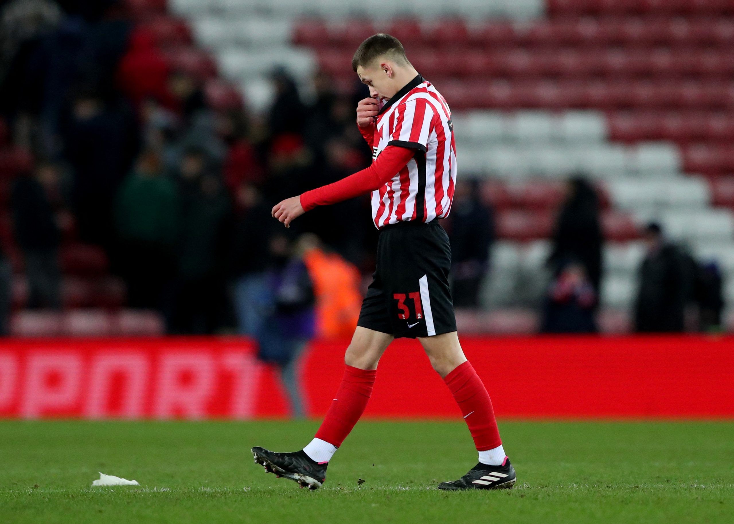 Soccer Football - FA Cup - Fourth Round Replay - Sunderland v Fulham - Stadium of Light, Sunderland, Britain - February 8, 2023  Sunderland's Chris Rigg looks dejected after the match REUTERS/Scott Heppell