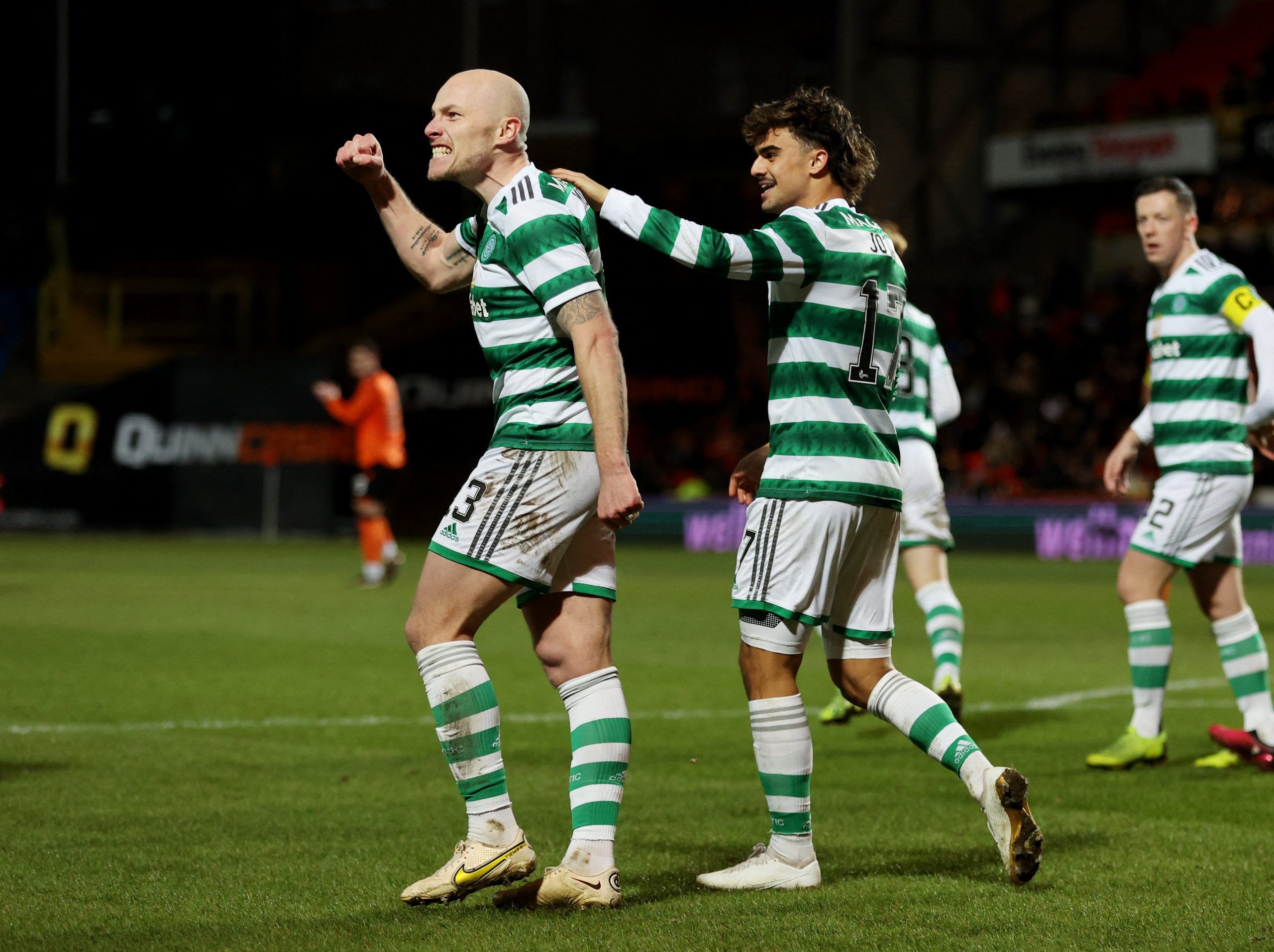 Soccer Football - Scottish Premiership - Dundee United v Celtic - Tannadice Park, Dundee, Scotland, Britain - January 29, 2023 Celtic's Jota celebrates scoring their first goal with Aaron Mooy REUTERS/Russell Cheyne