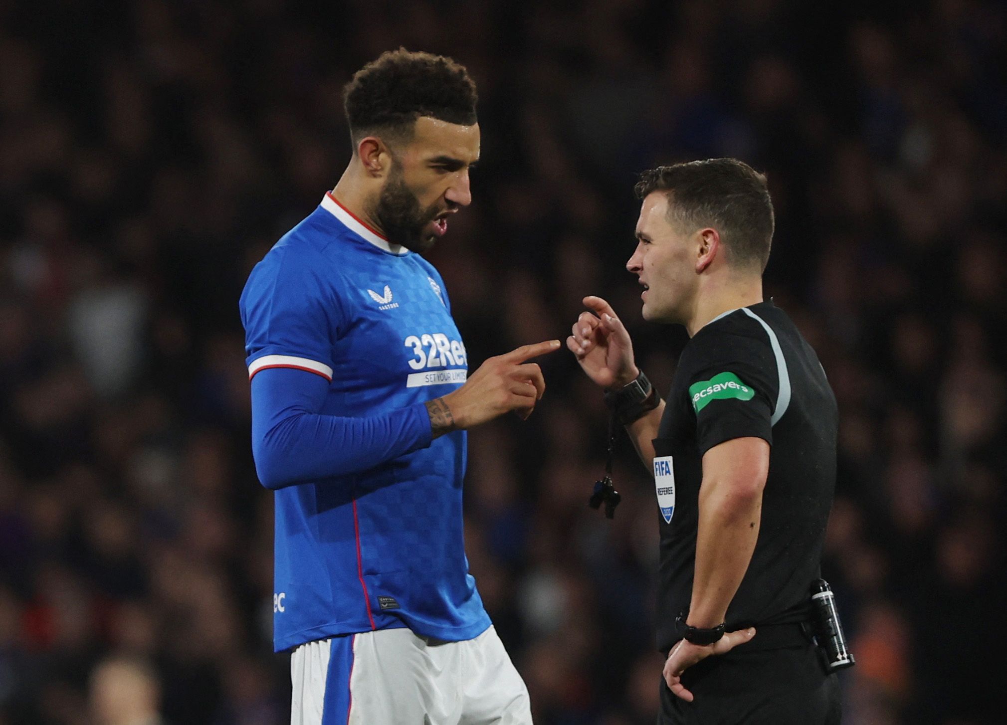 Soccer Football - Scottish League Cup - Semi Final - Rangers v Aberdeen - Hampden Park, Glasgow, Scotland, Britain - January 15, 2023 Rangers' Connor Goldson remonstrates with referee Nick Walsh REUTERS/Russell Cheyne