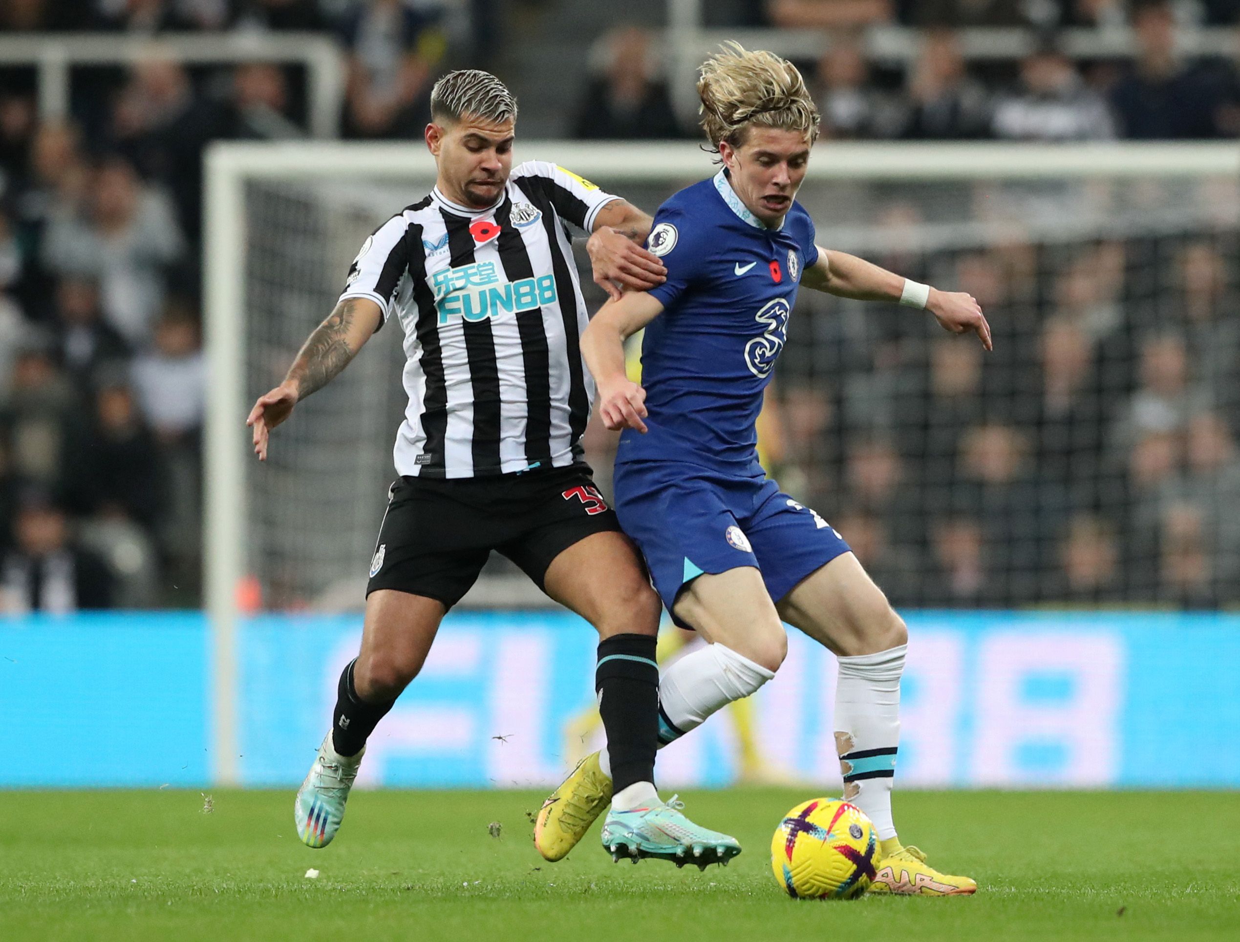 Soccer Football - Premier League - Newcastle United v Chelsea - St James' Park, Newcastle, Britain - November 12, 2022 Newcastle United's Bruno Guimaraes in action with Chelsea's Conor Gallagher REUTERS/Scott Heppell EDITORIAL USE ONLY. No use with unauthorized audio, video, data, fixture lists, club/league logos or 'live' services. Online in-match use limited to 75 images, no video emulation. No use in betting, games or single club /league/player publications.  Please contact your account repre