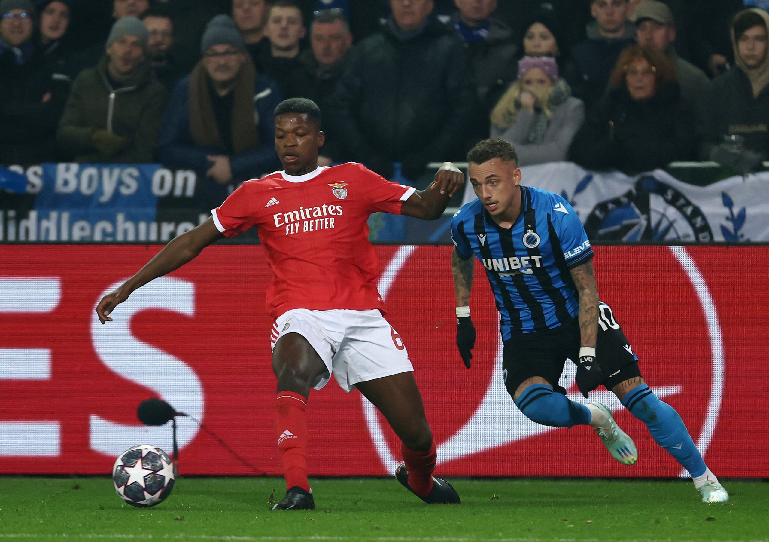 Soccer Football - Champions League - Round of 16 First Leg - Club Brugge v Benfica - Jan Breydel Stadium, Bruges, Belgium - February 15, 2023 Benfica's Florentino in action with Club Brugge's Noa Lang REUTERS/Yves Herman