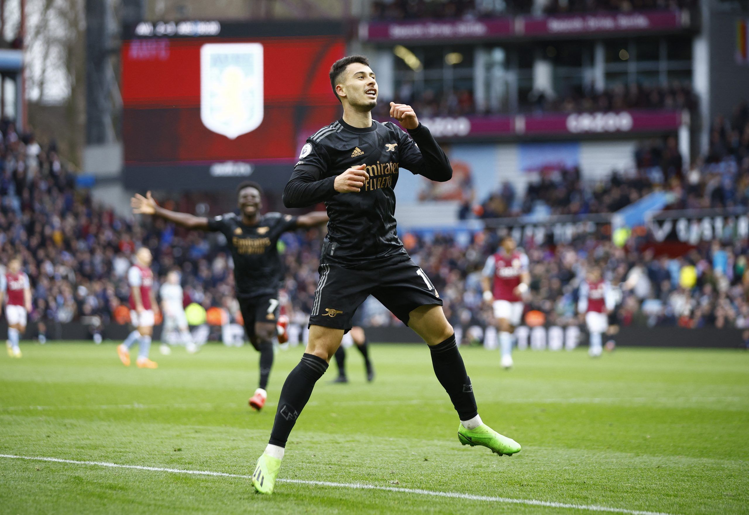 Soccer Football - Premier League - Aston Villa v Arsenal - Villa Park, Birmingham, Britain - February 18, 2023 Arsenal's Gabriel Martinelli celebrates scoring their fourth goal Action Images via Reuters/John Sibley EDITORIAL USE ONLY. No use with unauthorized audio, video, data, fixture lists, club/league logos or 'live' services. Online in-match use limited to 75 images, no video emulation. No use in betting, games or single club /league/player publications.  Please contact your account represe